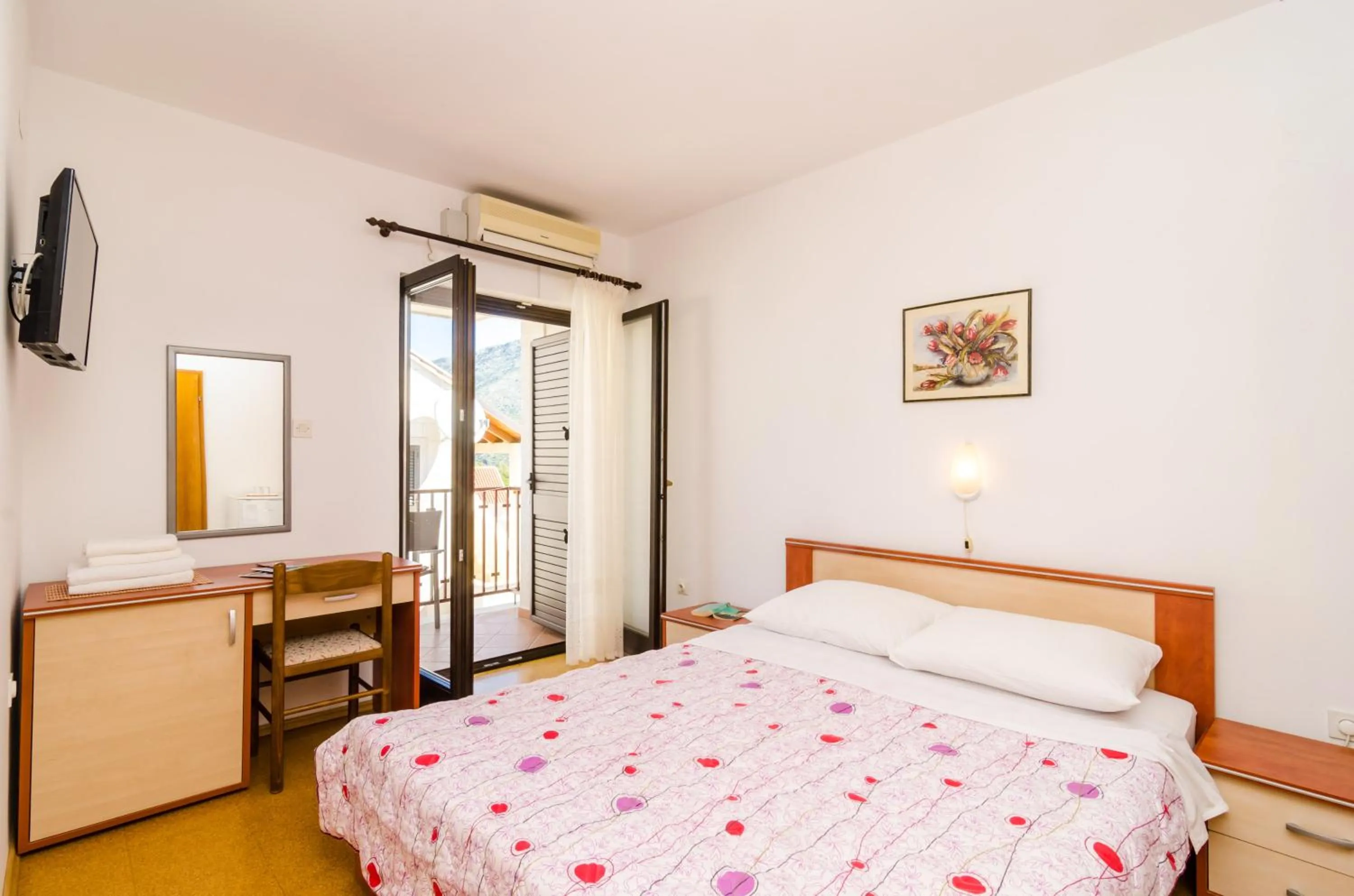 Bed in Cina Apartments