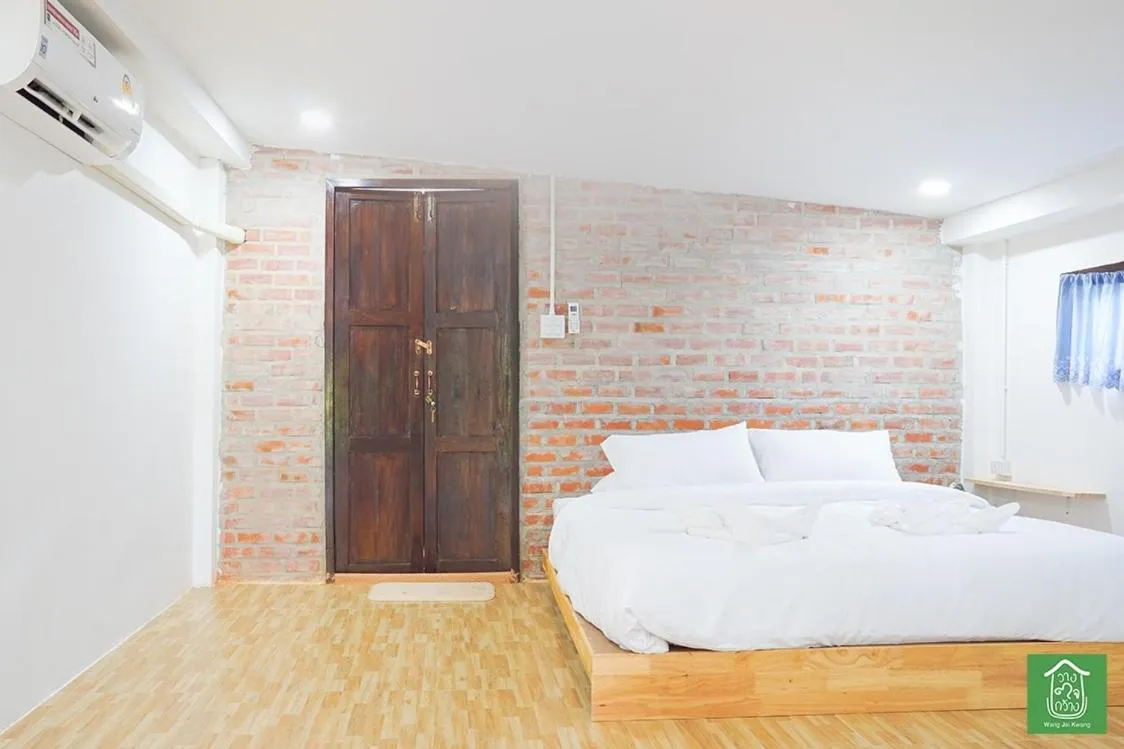 Bed in Wang Jai Kwang Space Inn