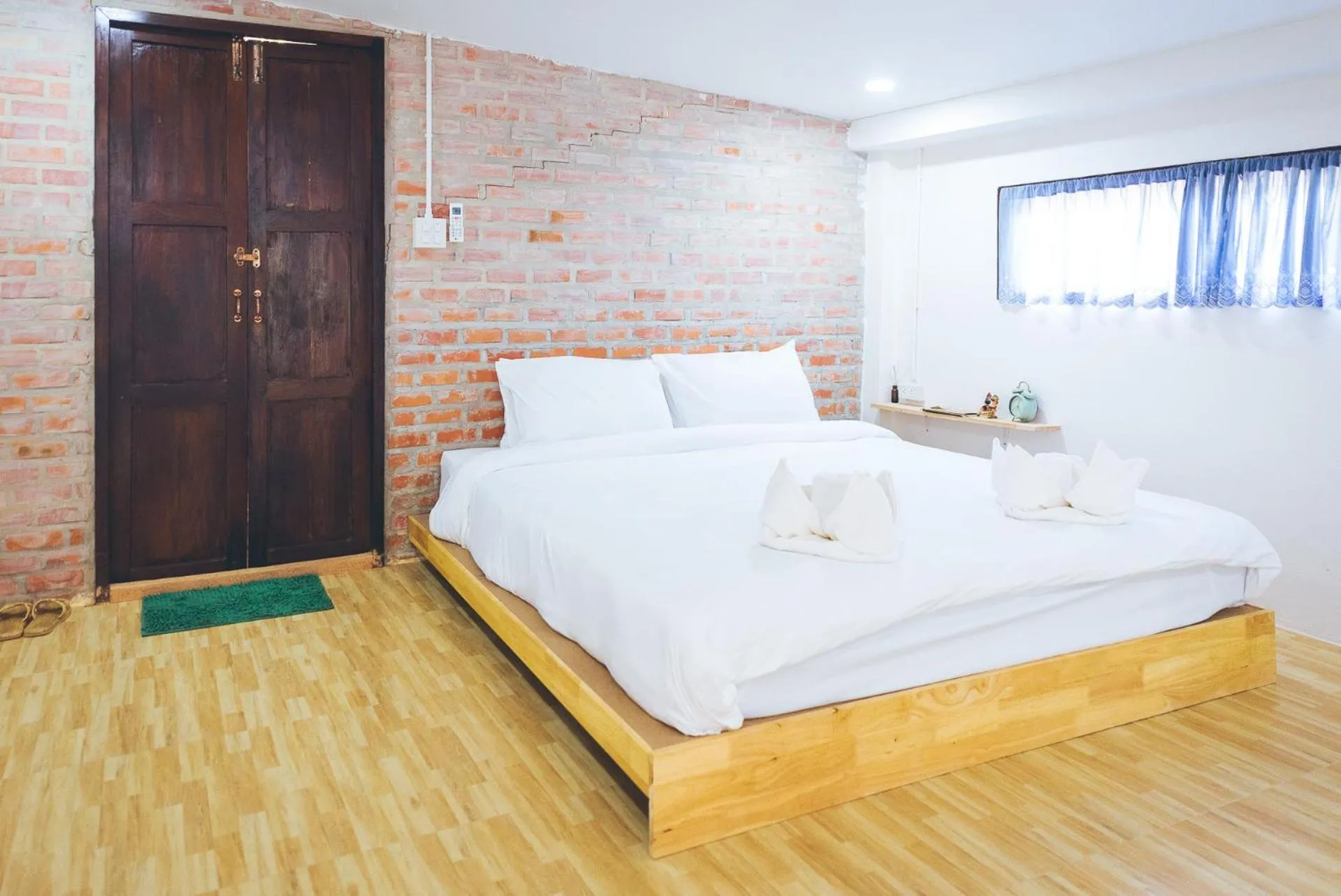 Bed in Wang Jai Kwang Space Inn