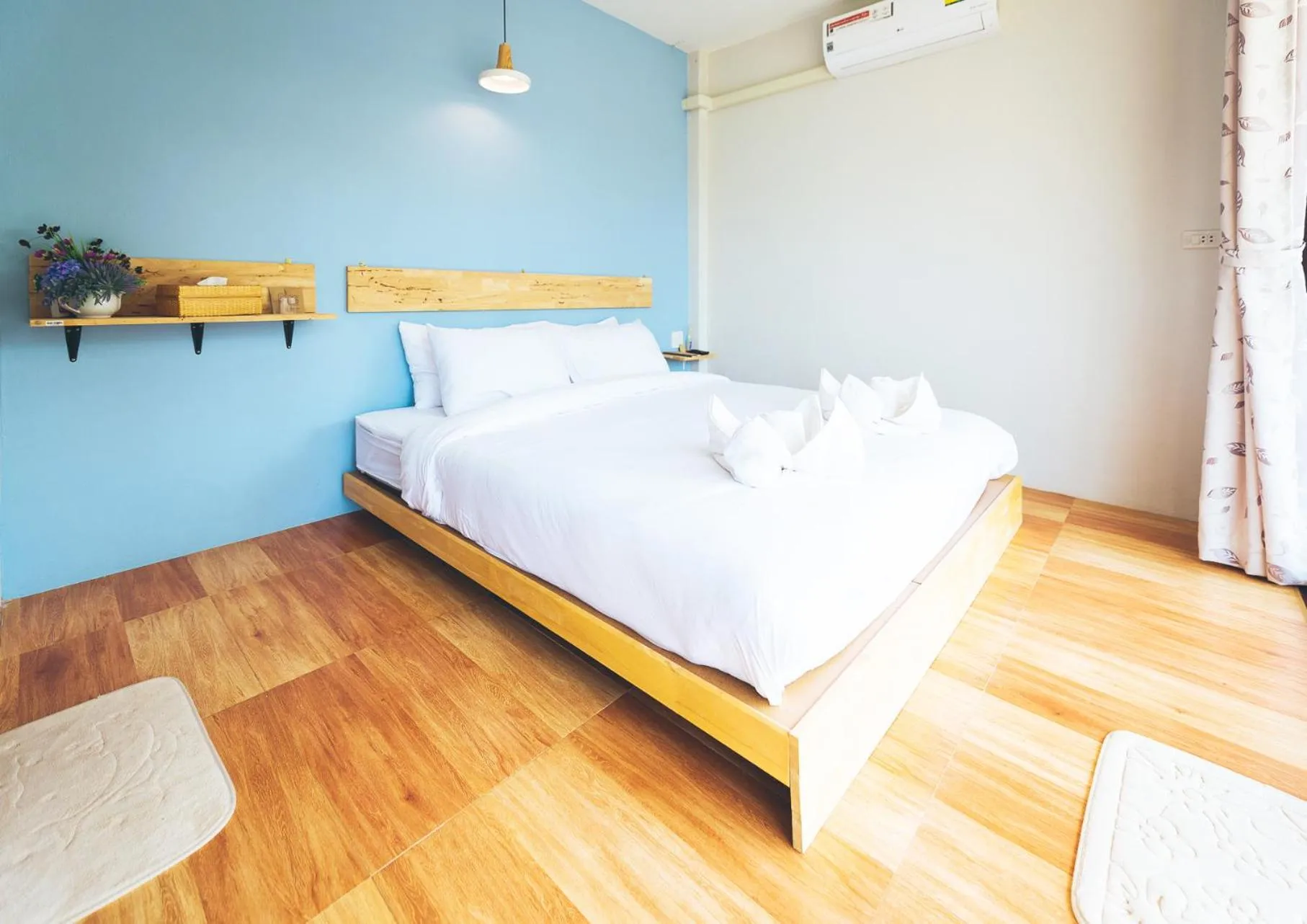 Bed in Wang Jai Kwang Space Inn