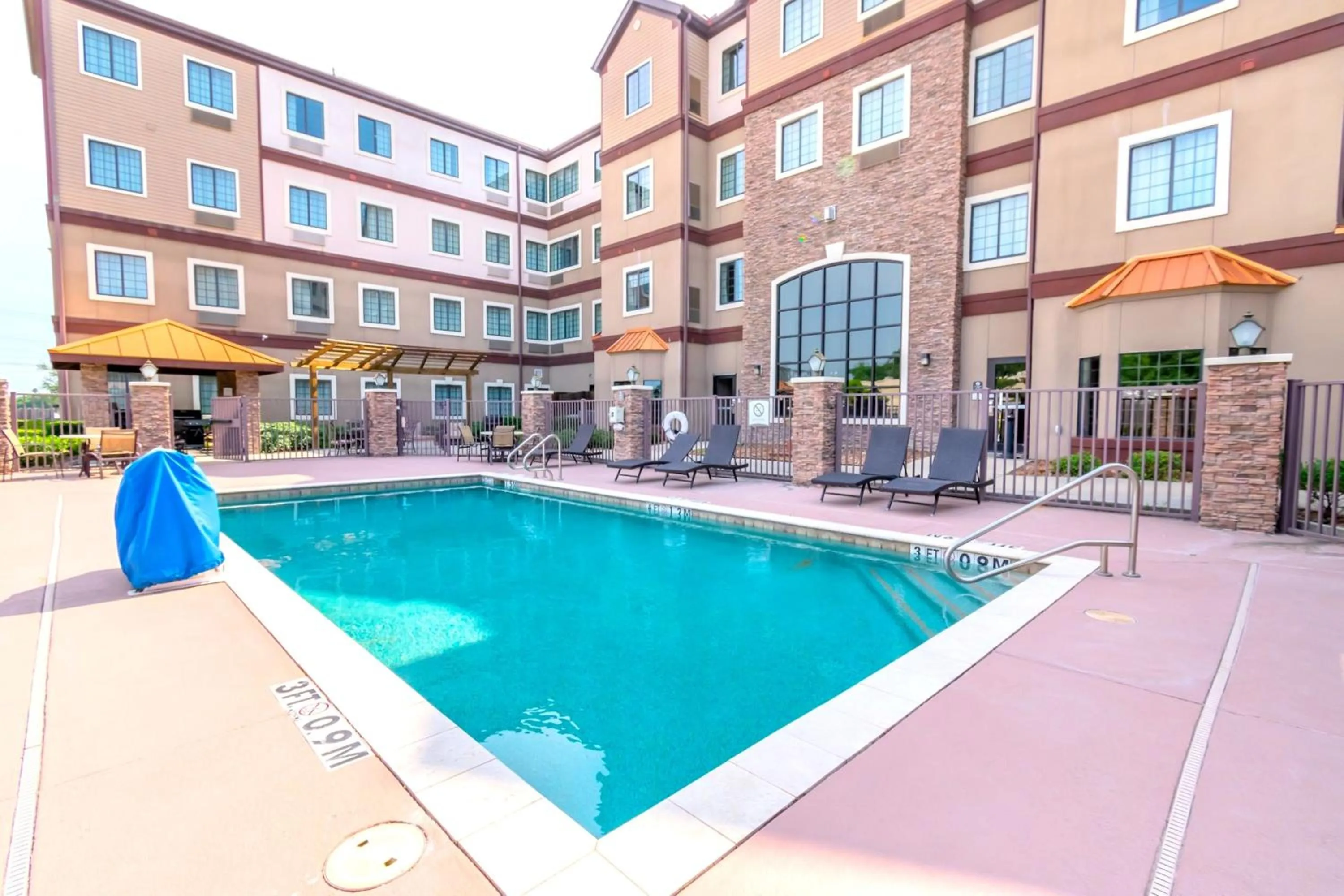 Swimming pool in Staybridge Suites Houston - IAH Airport by IHG