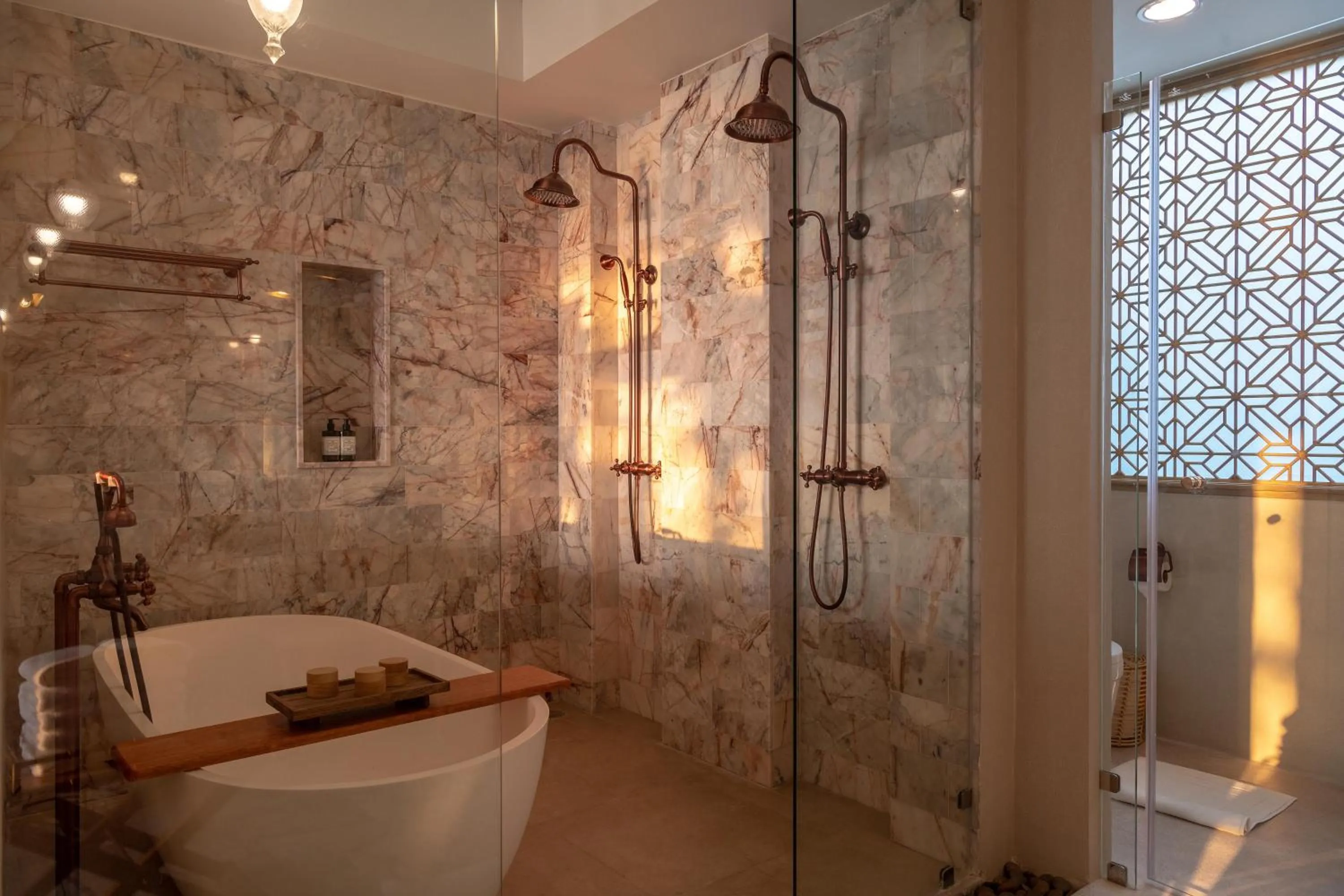 Bathroom in Devasom Khao Lak Beach Resort & Villas