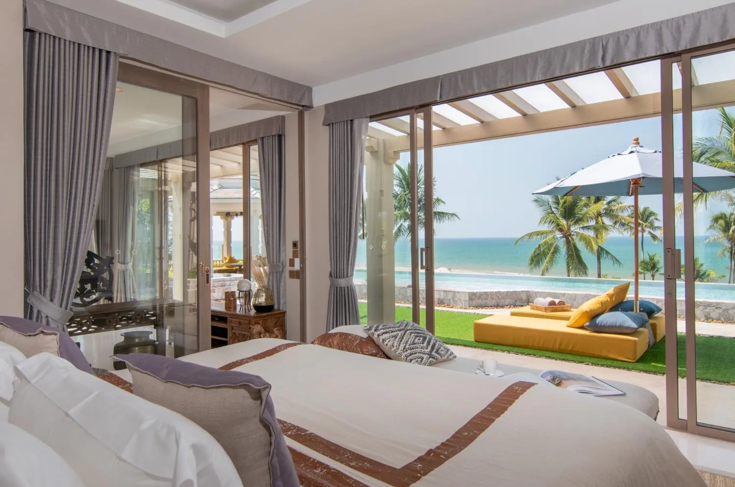 Bed in Devasom Khao Lak Beach Resort & Villas