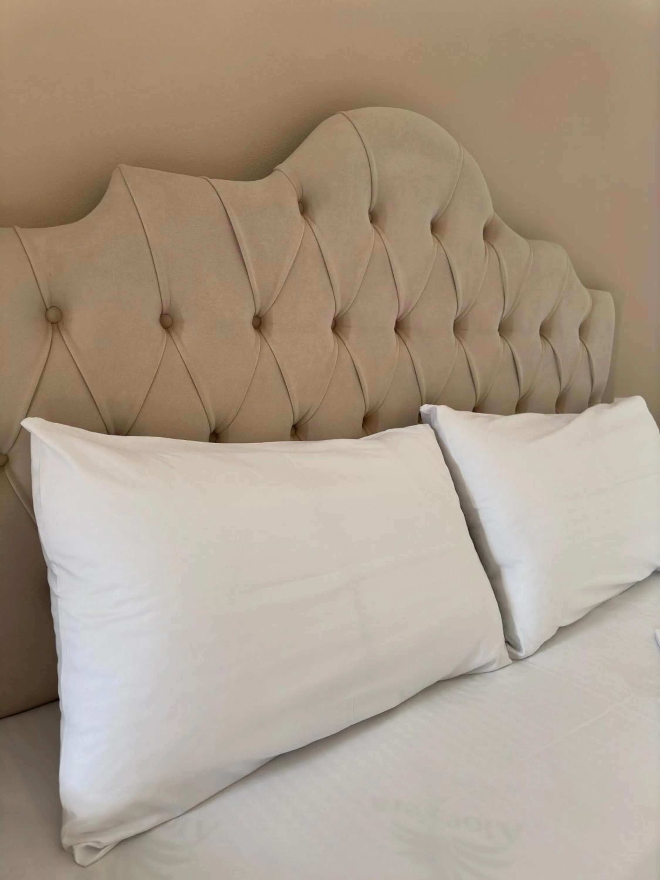 Bed in Evelina Ernild Rooms