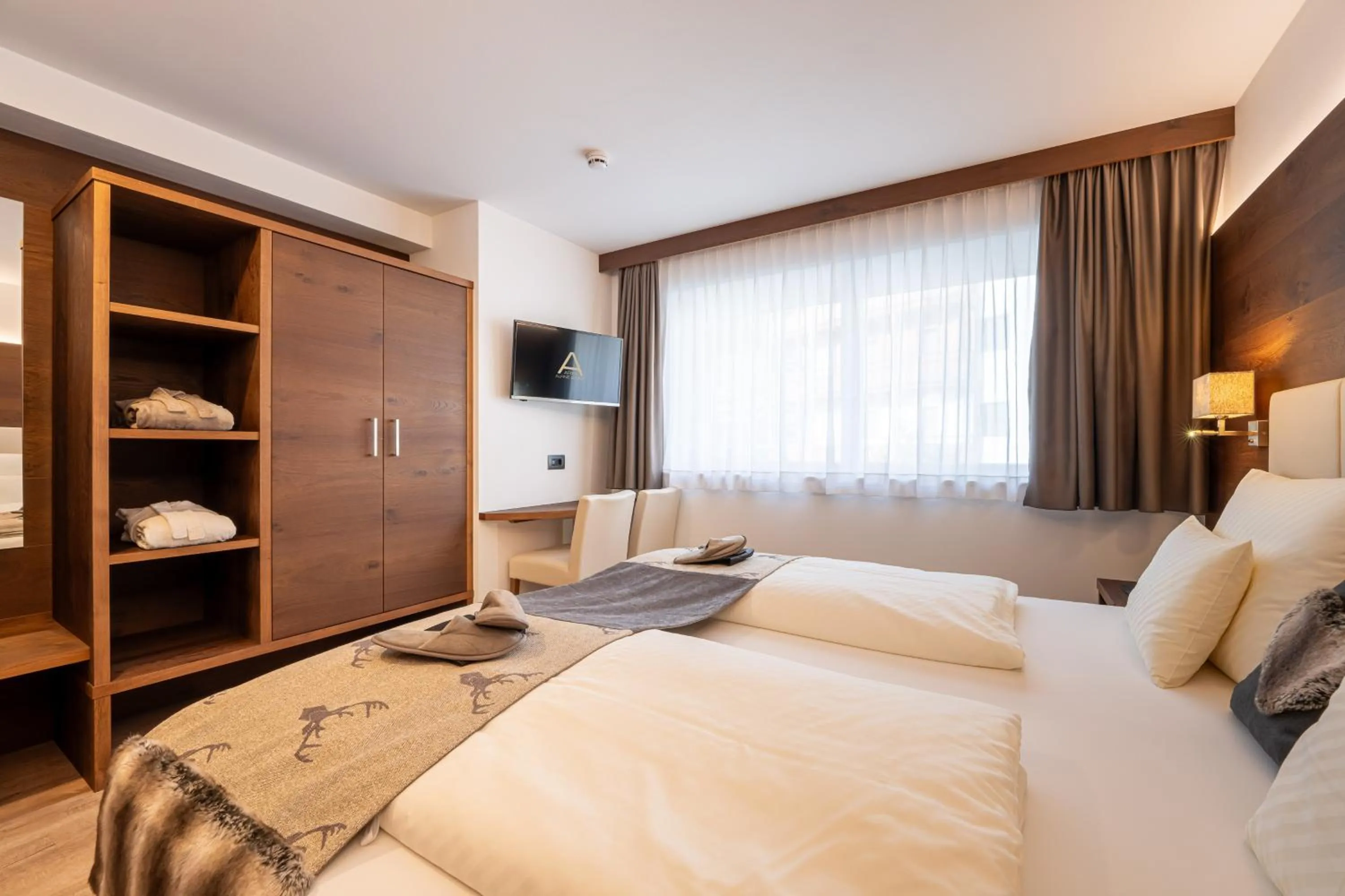 Bed in Arya Alpine Lodge