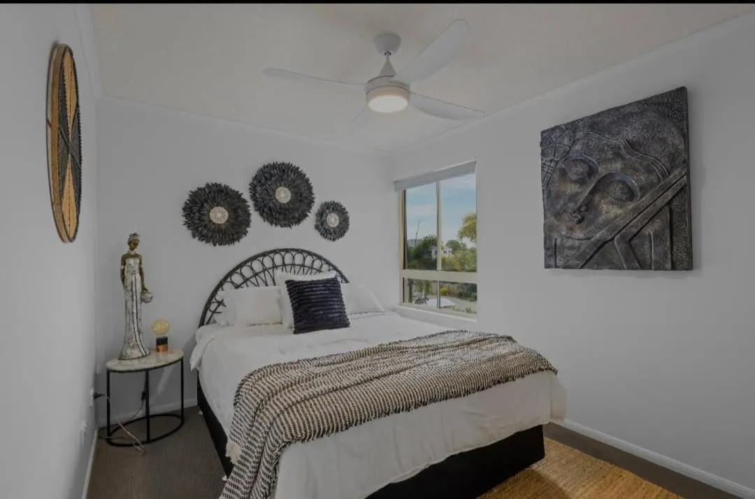 Bed in On The River Apartments