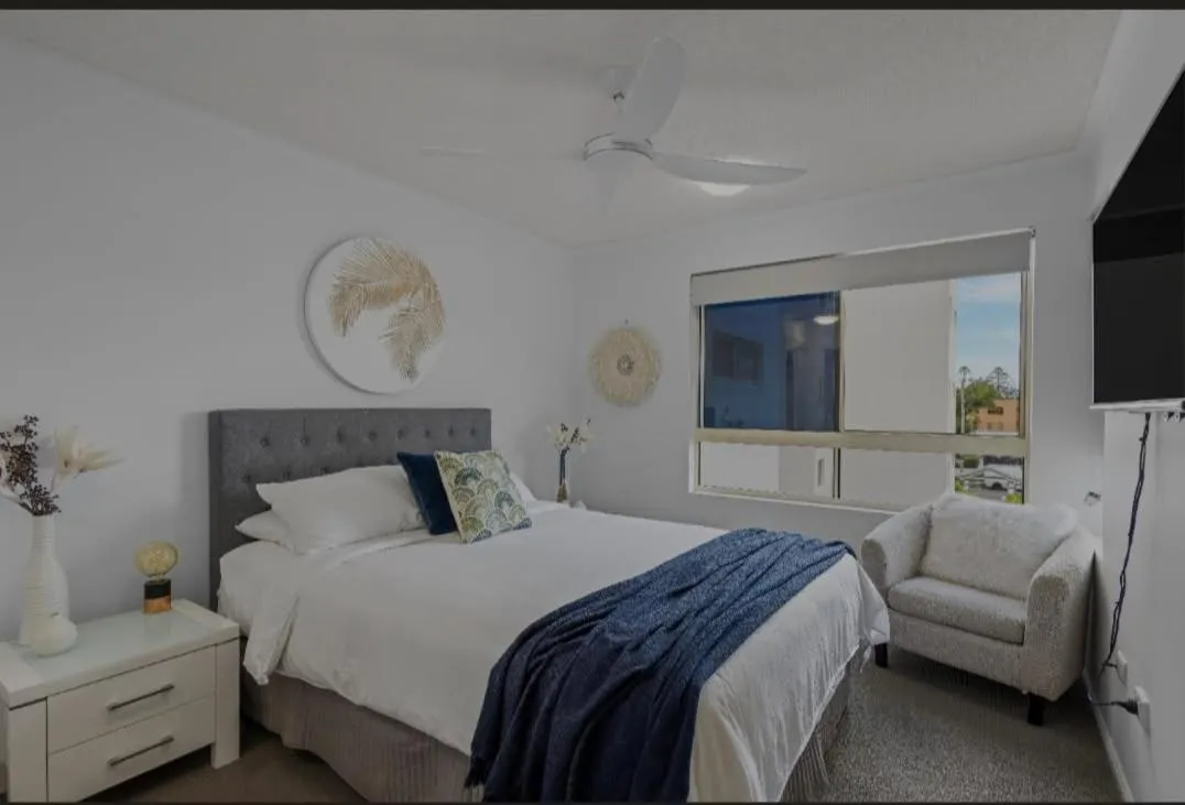 Bed in On The River Apartments