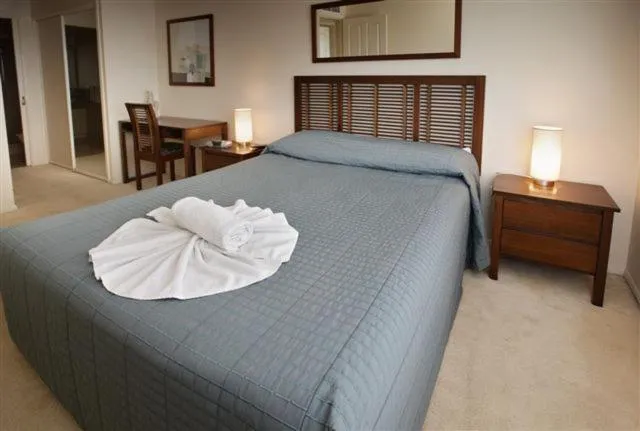 Bed in On The River Apartments