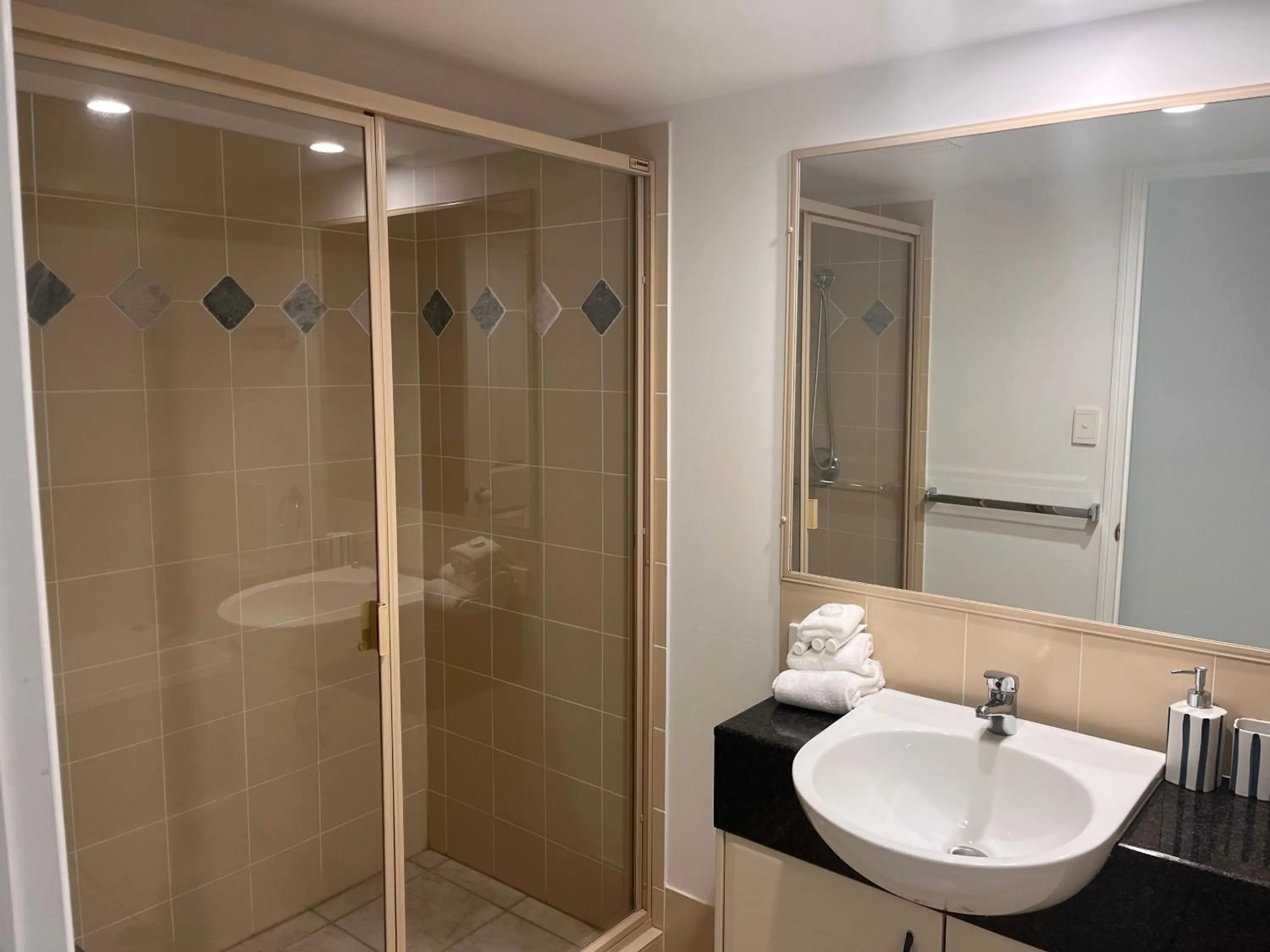 Shower in On The River Apartments