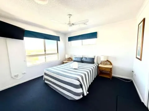 Bed in On The River Apartments