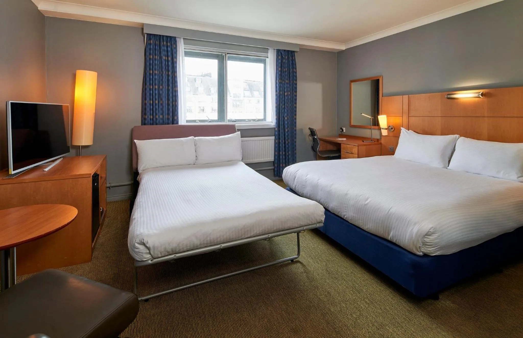 Photo of the whole room, Bed in Holiday Inn London Bloomsbury by IHG