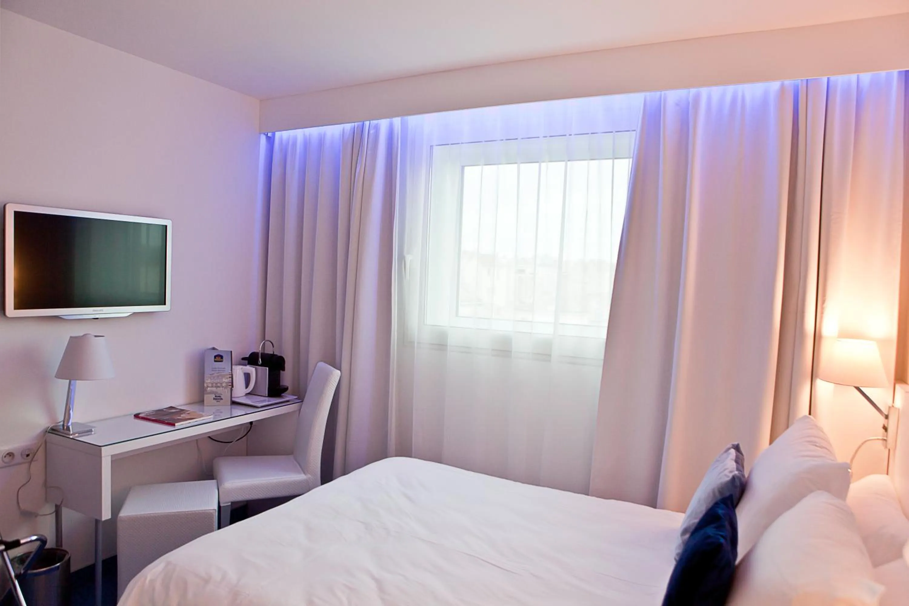 Bed in Privilège Hôtel & Apparts Eurociel Centre Comédie