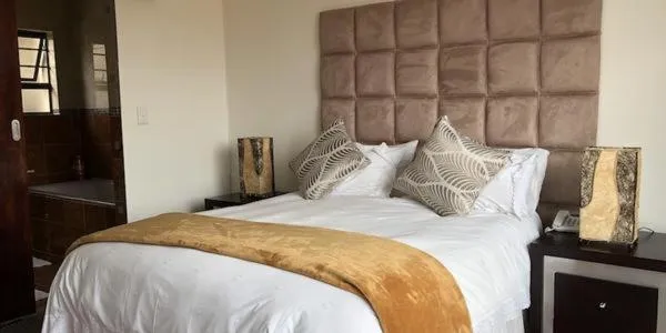 Bed in Coral Beach Bed & Breakfast