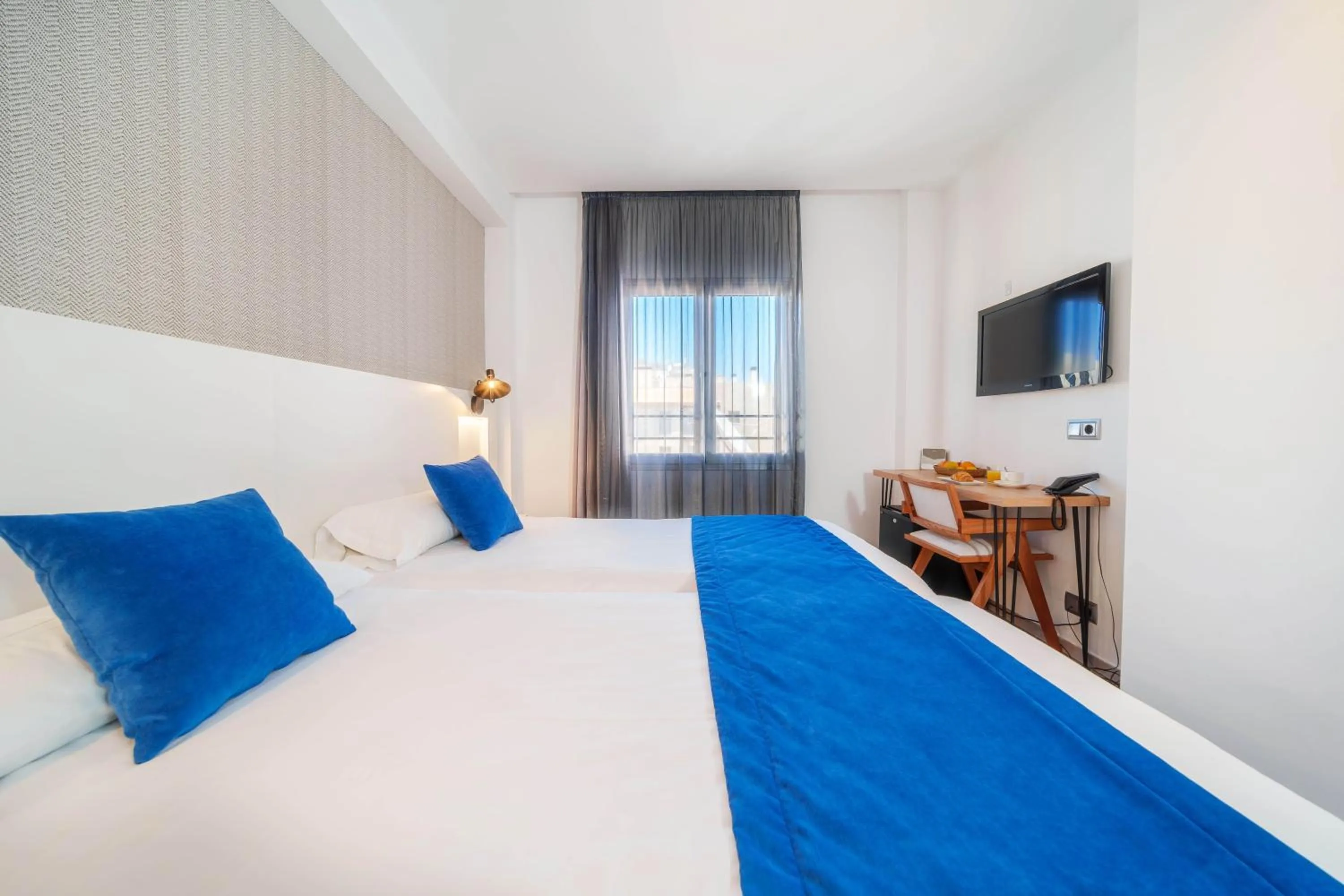 Bed in Mar Calma Hotel