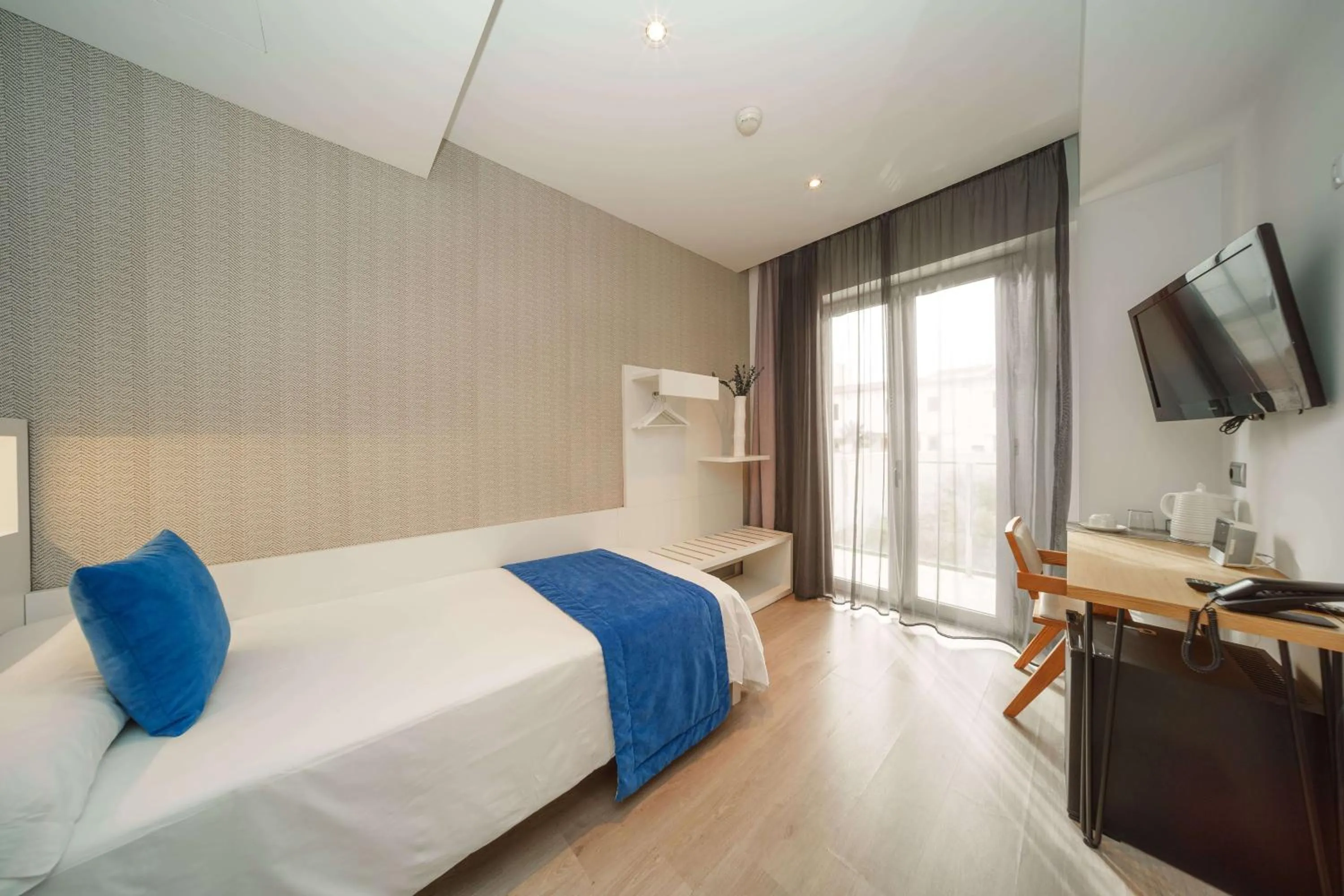 Bed in Mar Calma Hotel