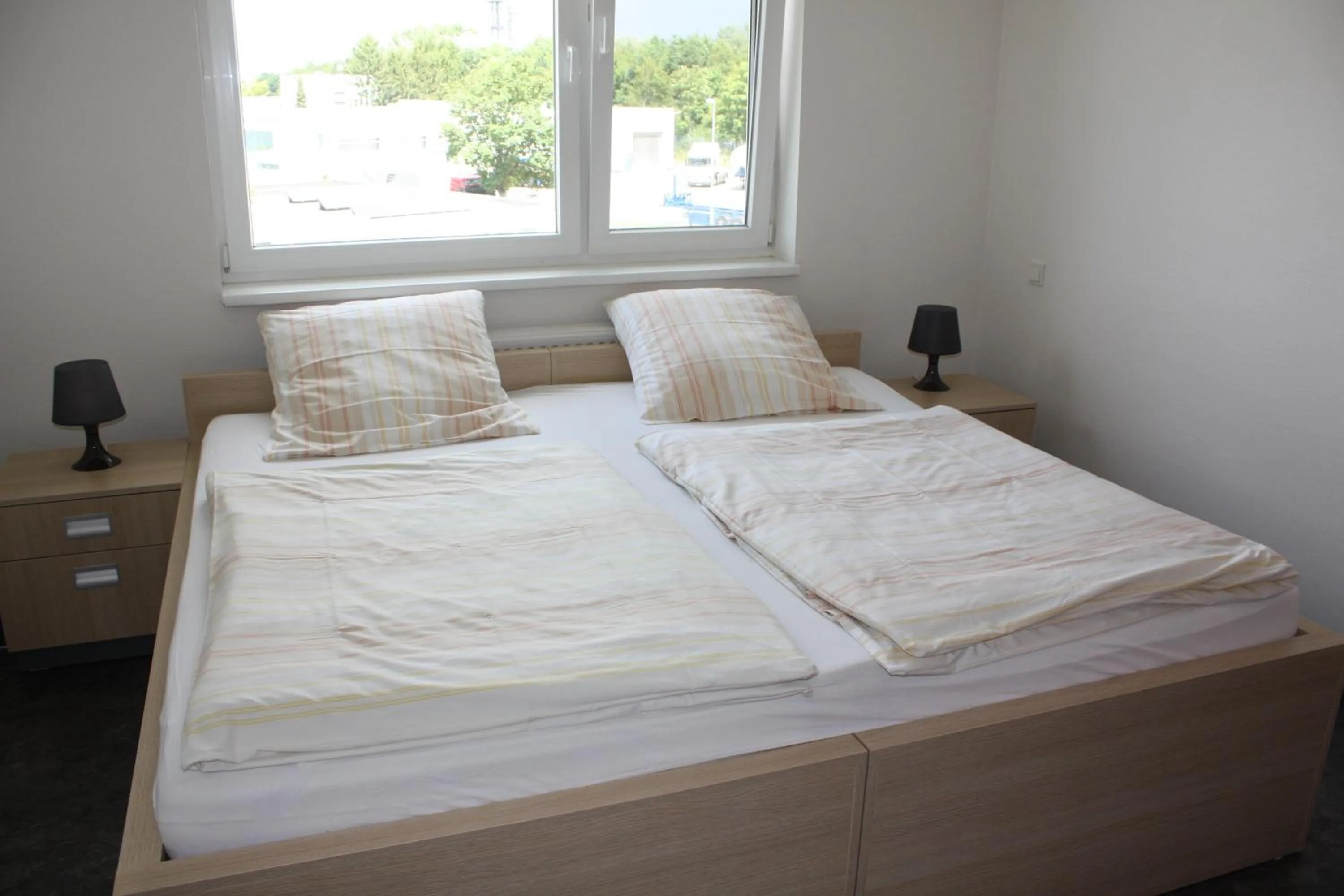 Bed in Hotel Grand Tour