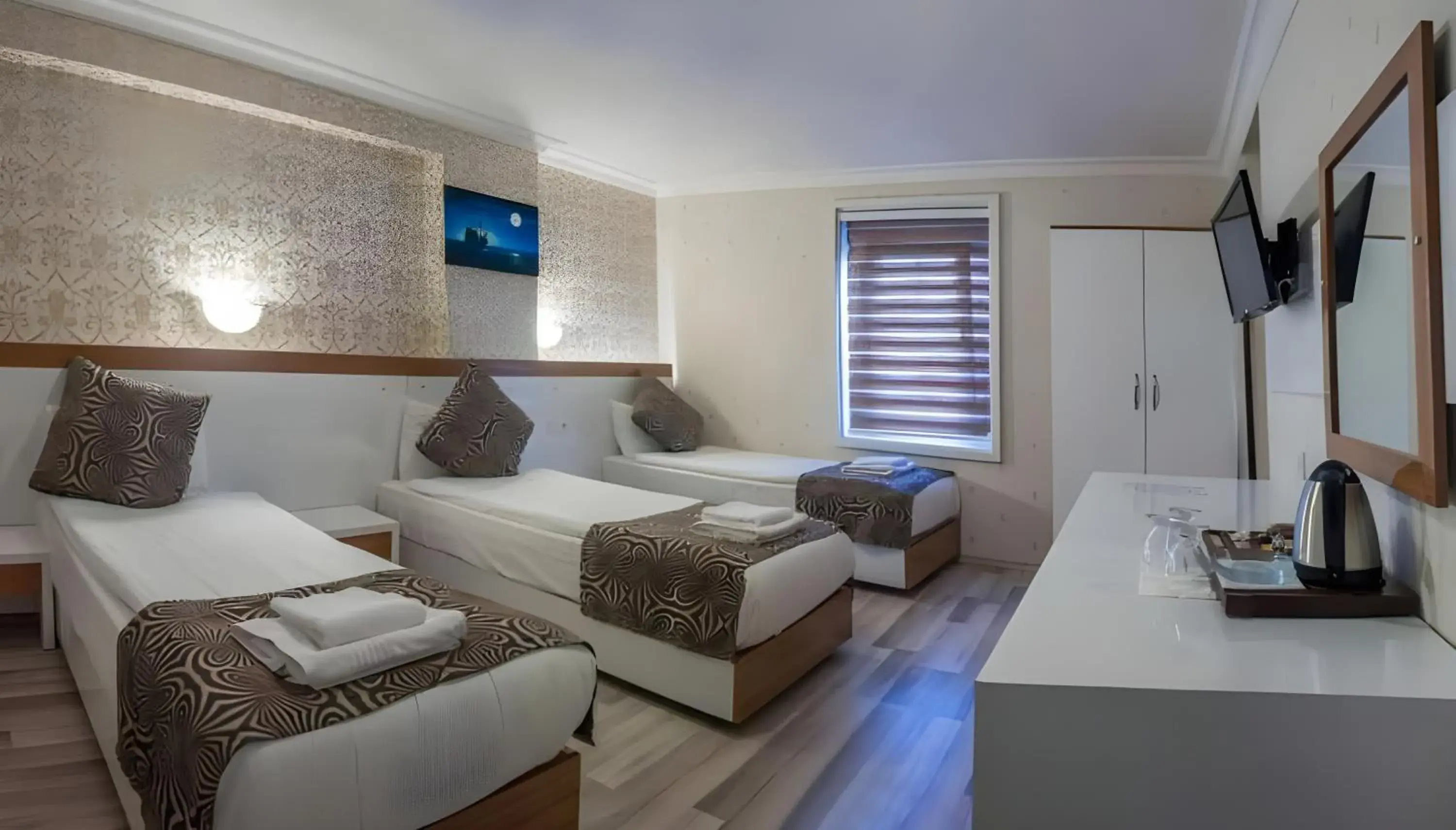 Comfort Triple Room with Shower in City Hotel Plovdiv Comfort Triple Room with Shower in City Hotel Plovdiv