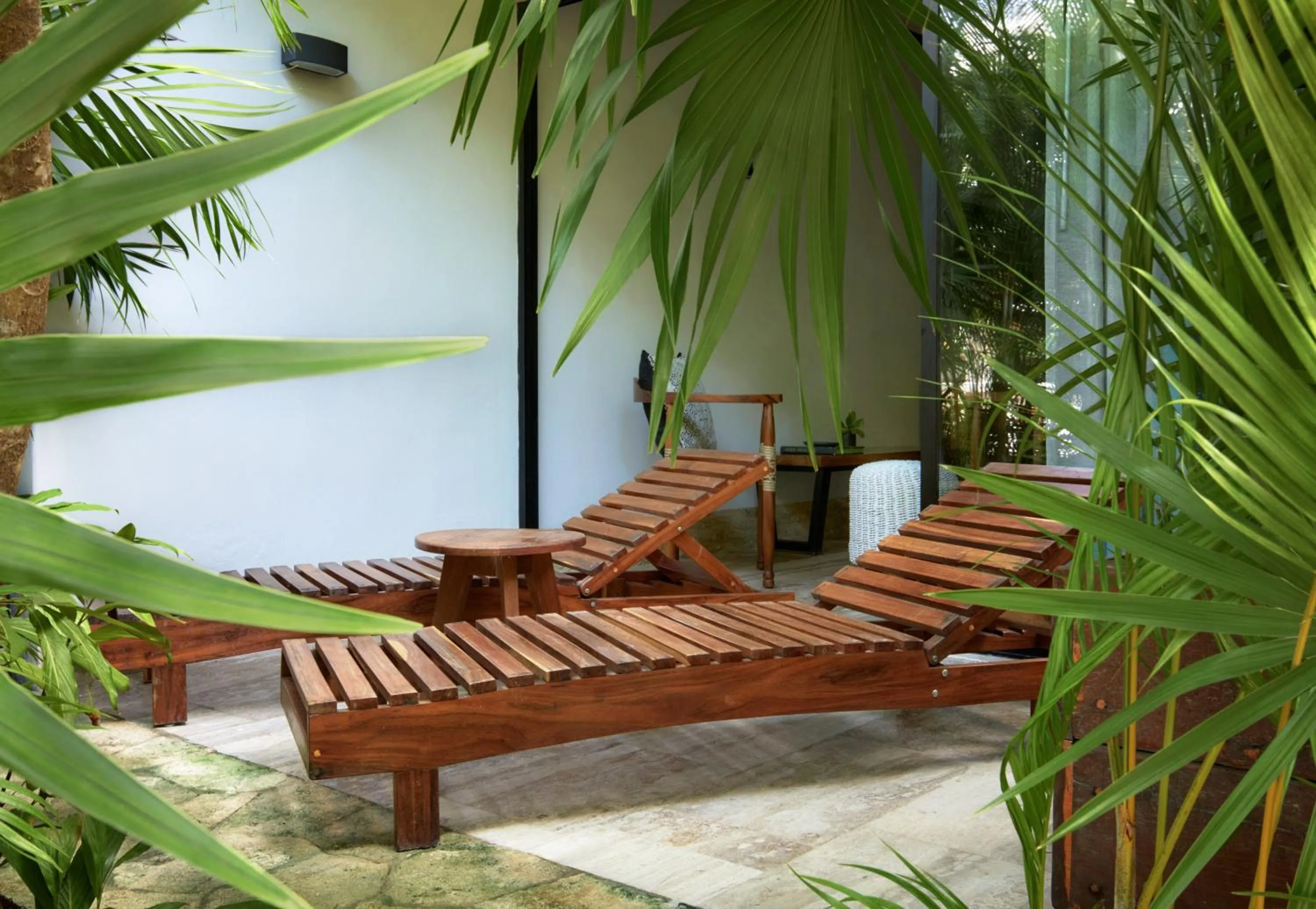 Patio in Kimpton Aluna Resort Tulum by IHG