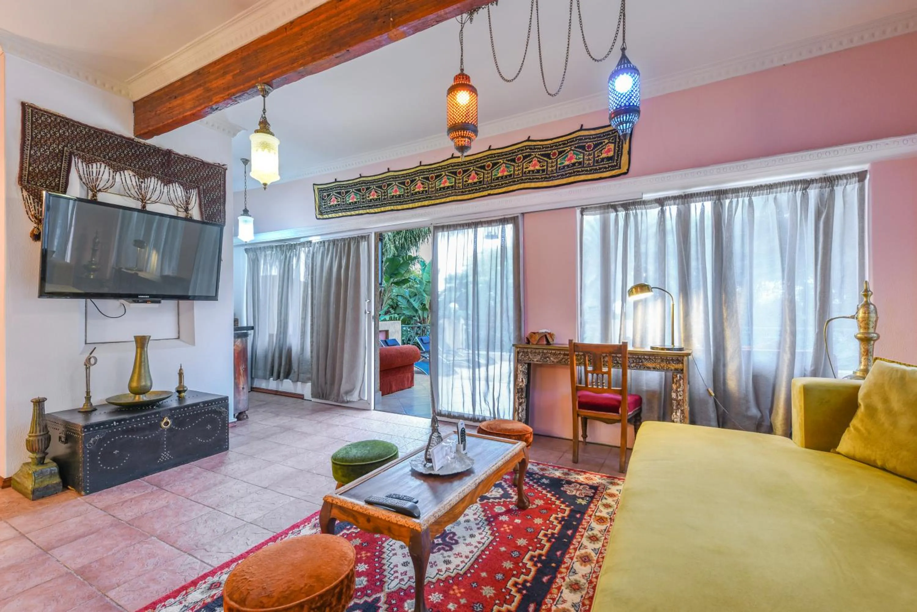 Communal lounge/ TV room in Villa Simonne