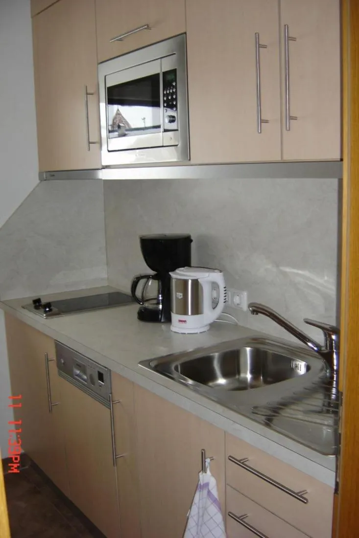 Kitchen or kitchenette in Gästehaus Bergland