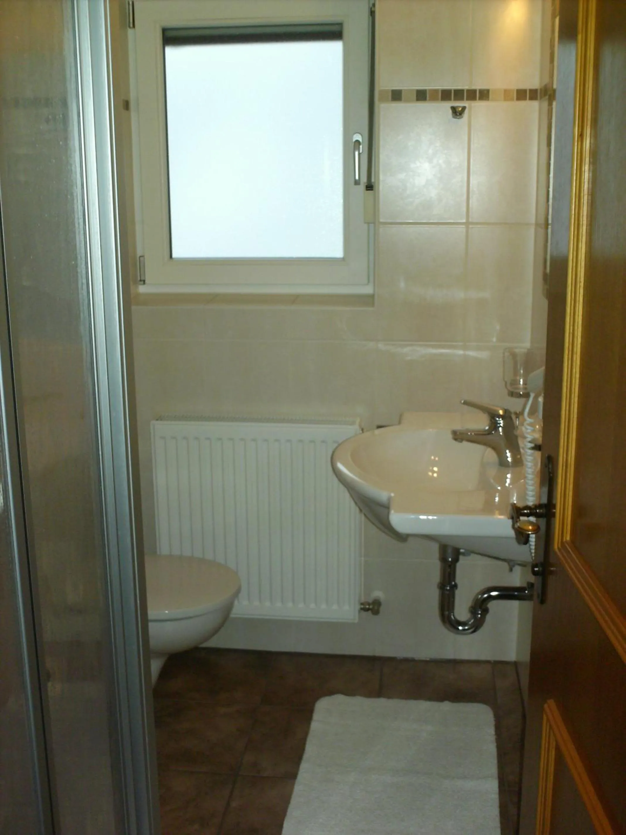 Bathroom in Gästehaus Bergland