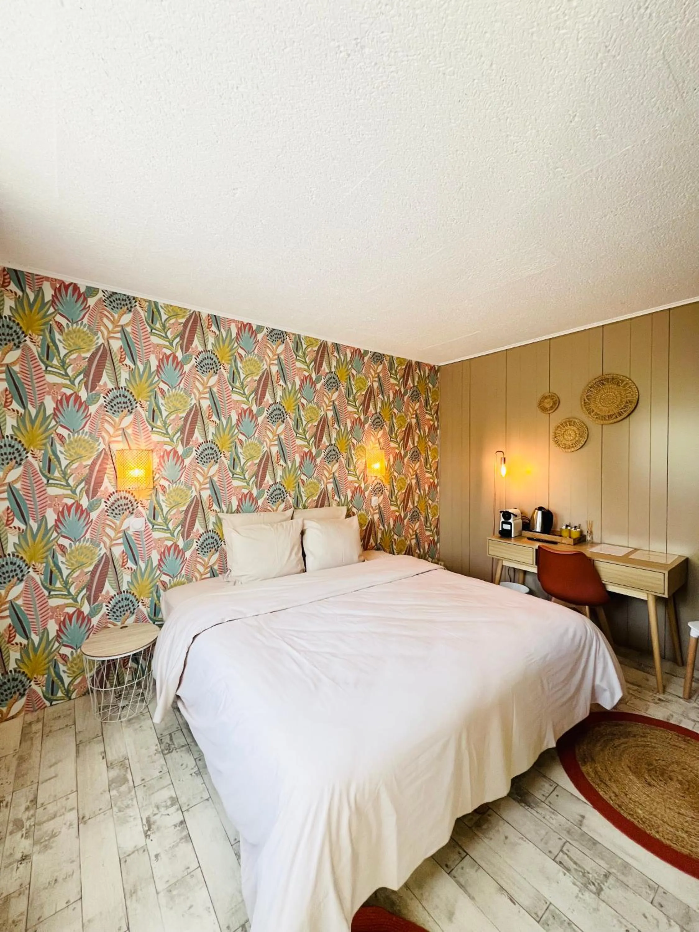 Bed in Motel Les Broussailles