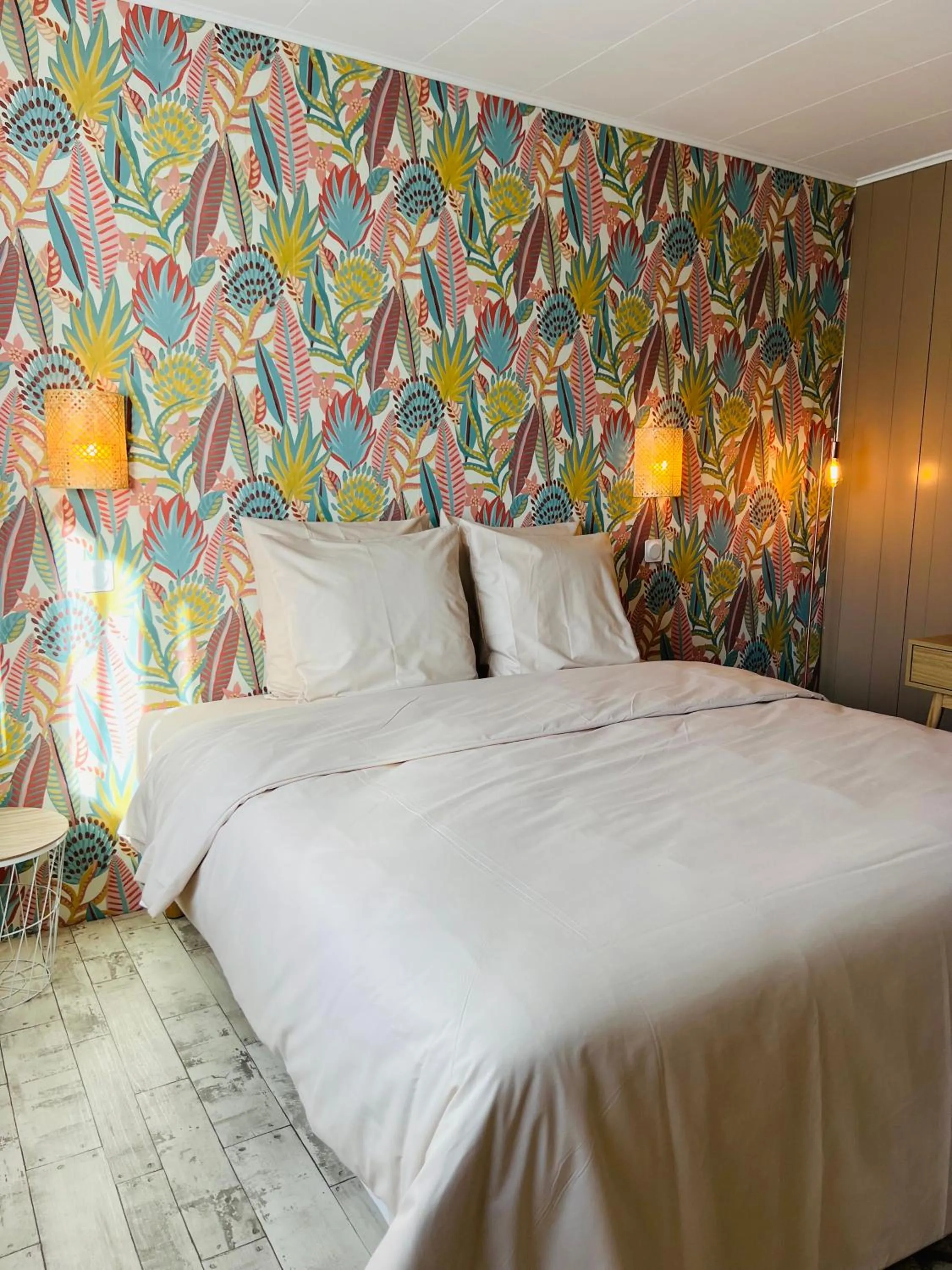 Bed in Motel Les Broussailles