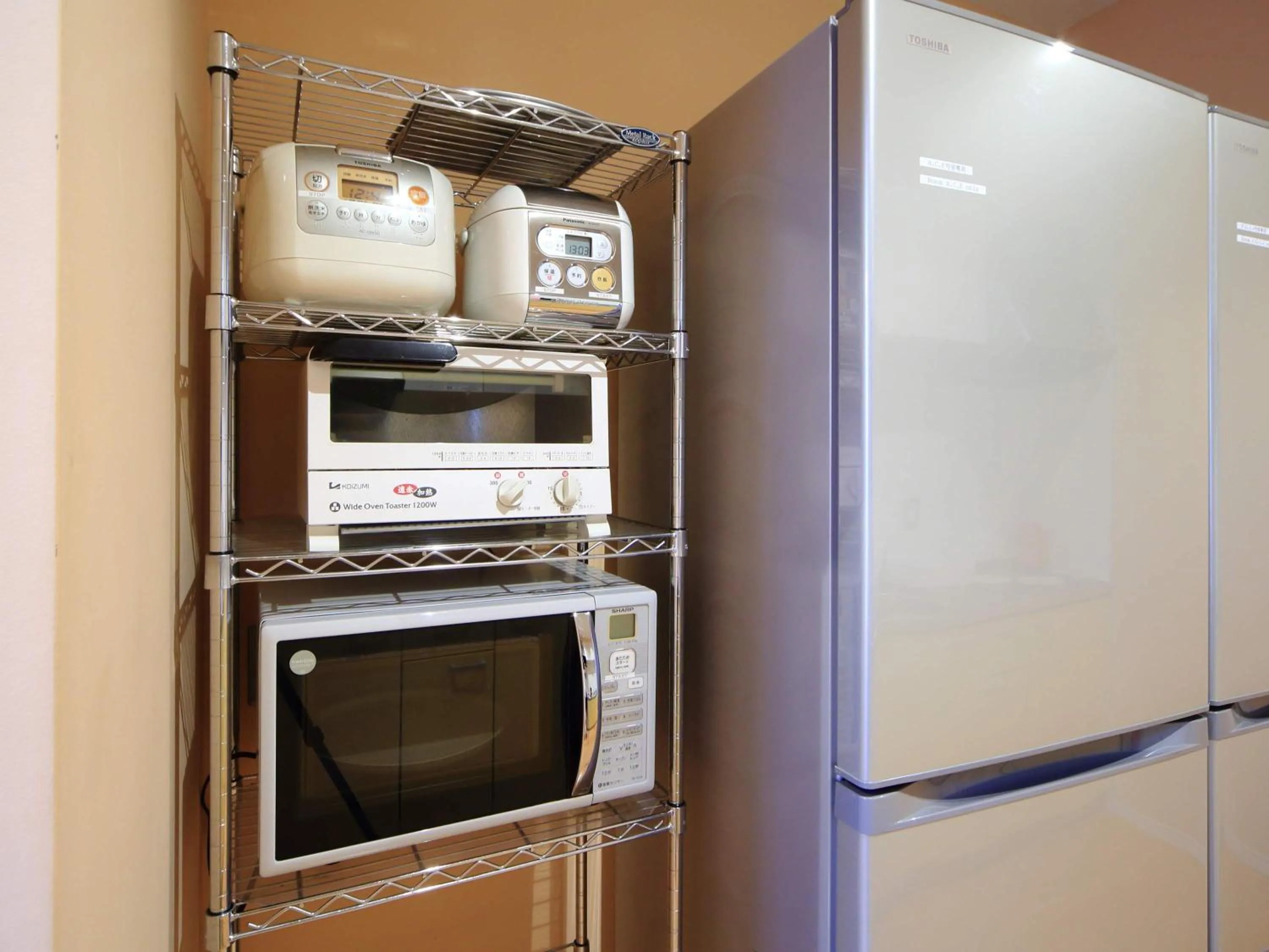 Communal kitchen in コージーイン 東京桜新町