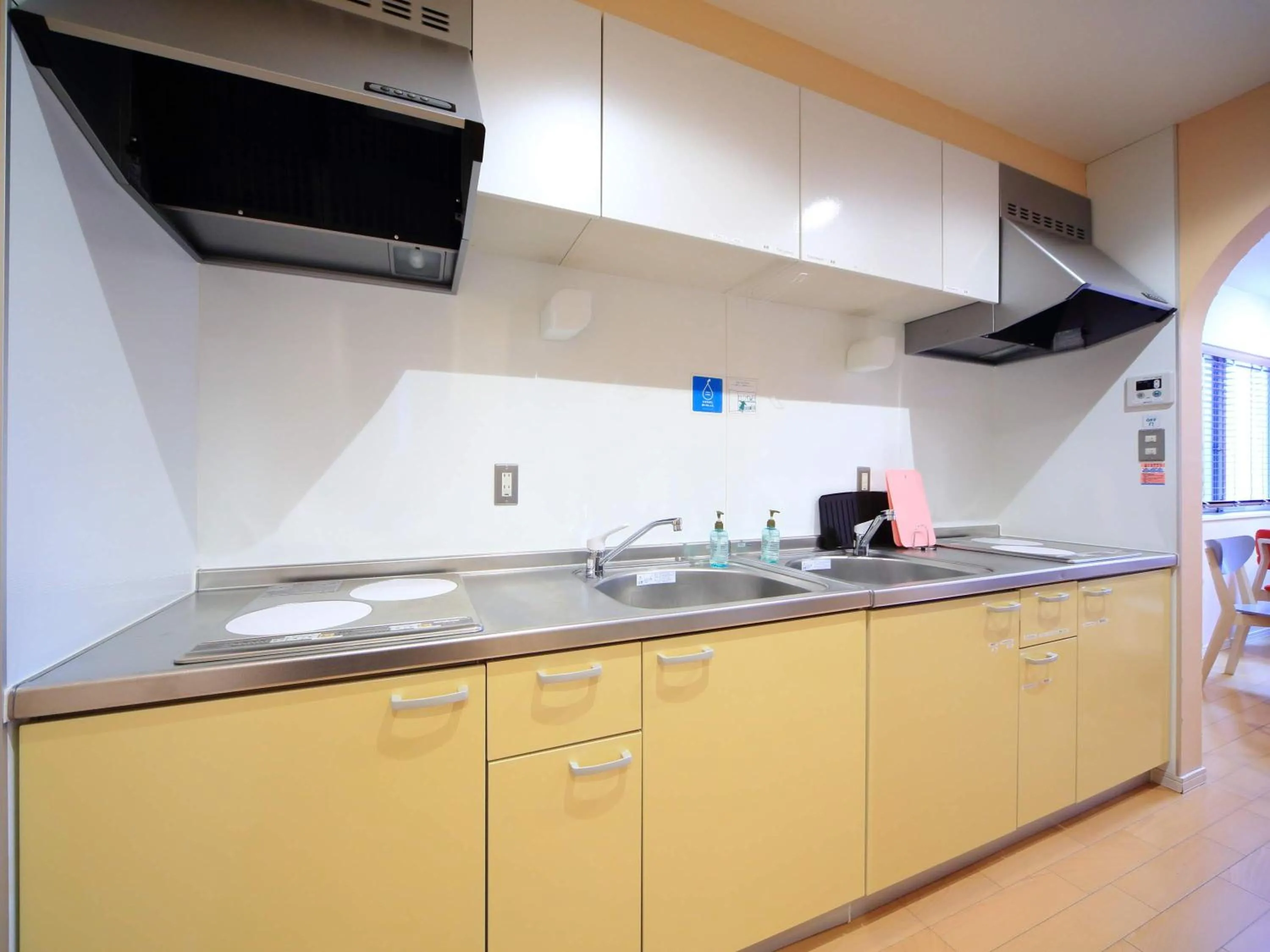 Kitchen or kitchenette in コージーイン 東京桜新町