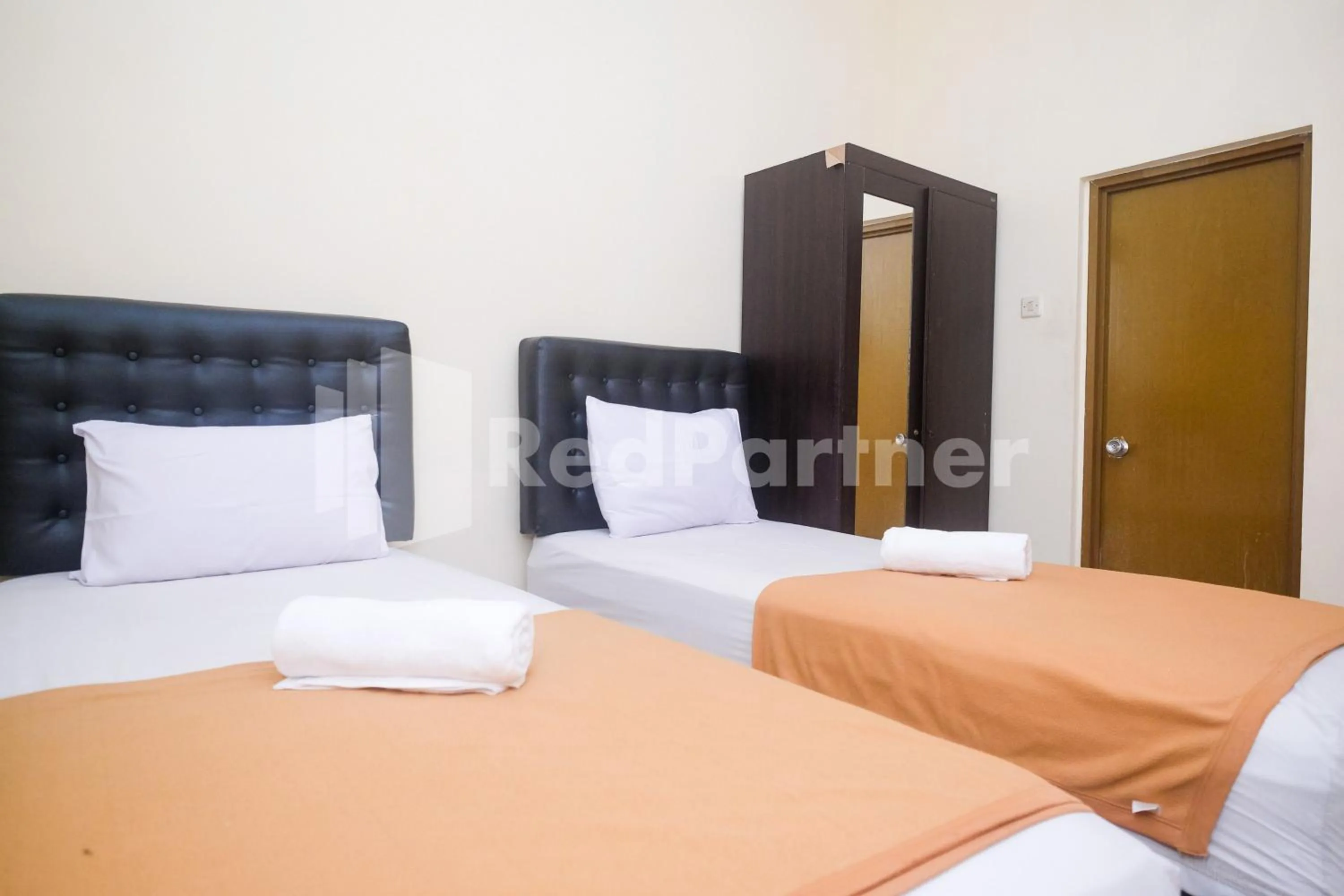 Bed in Griya Loka 1 Syariah Near RSUD Dr Kariadi Mitra RedDoorz