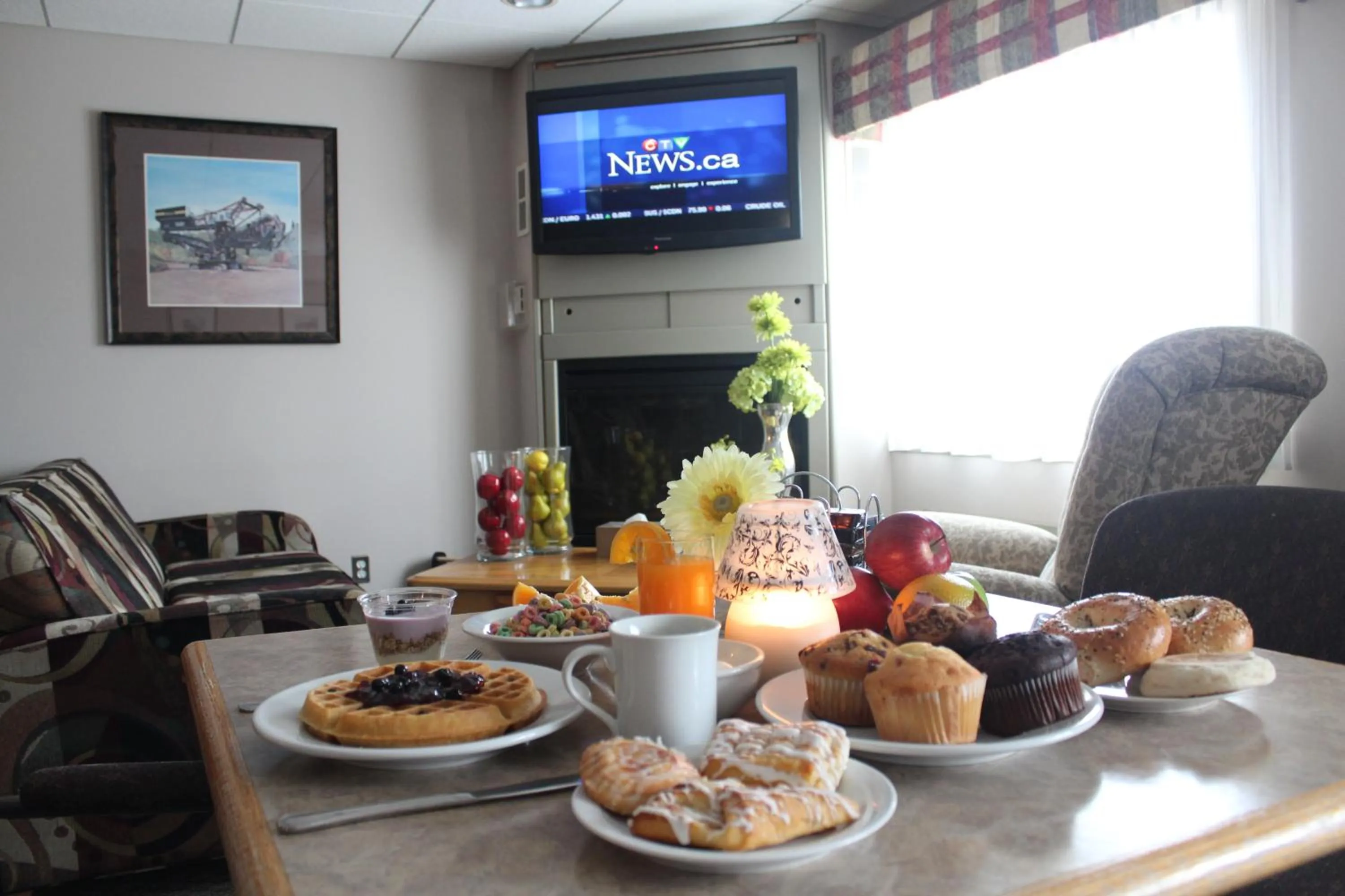 Communal lounge/ TV room in Travelodge by Wyndham Fort McMurray