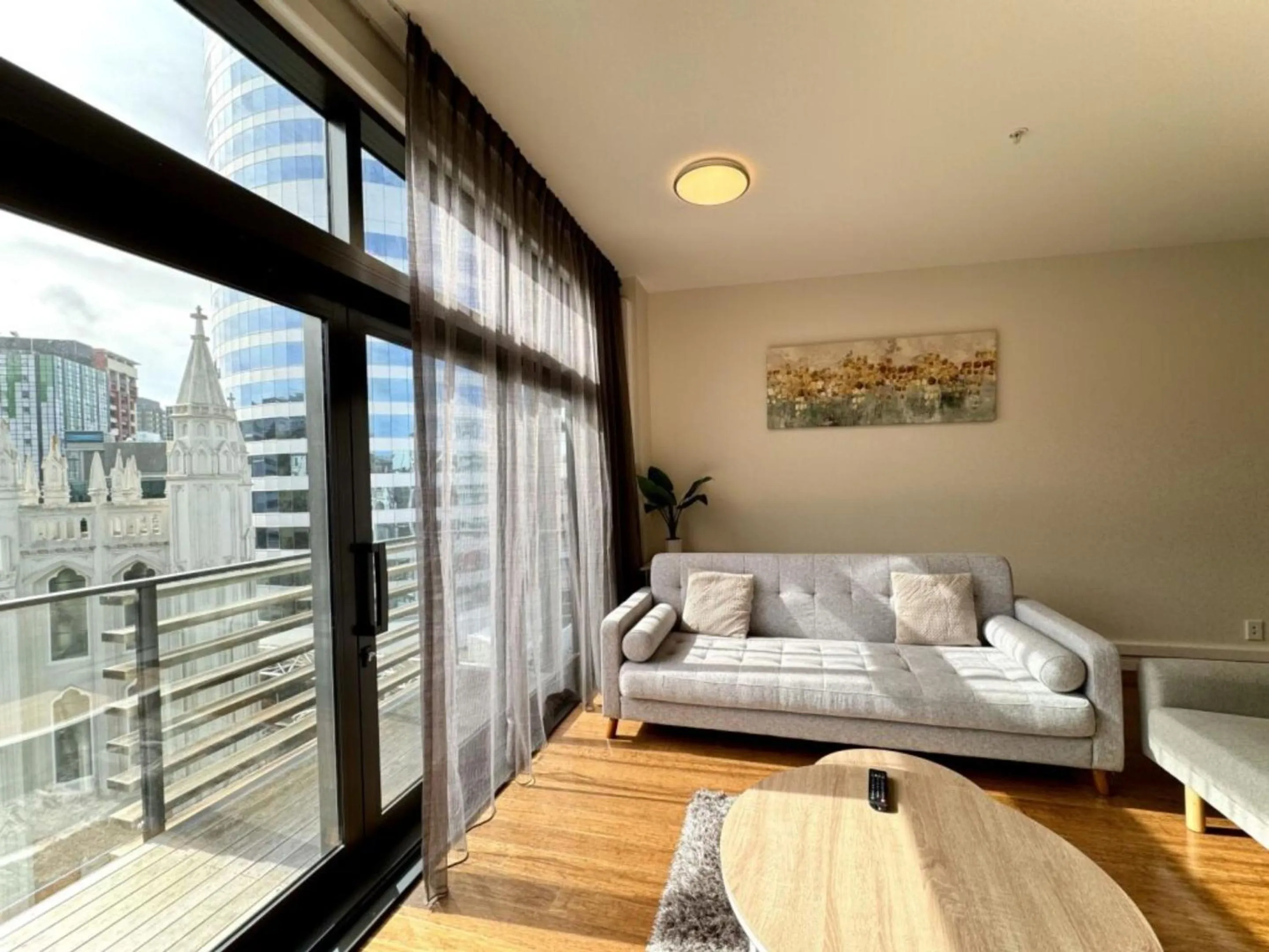Seating area, Bed in Boulcott Suites