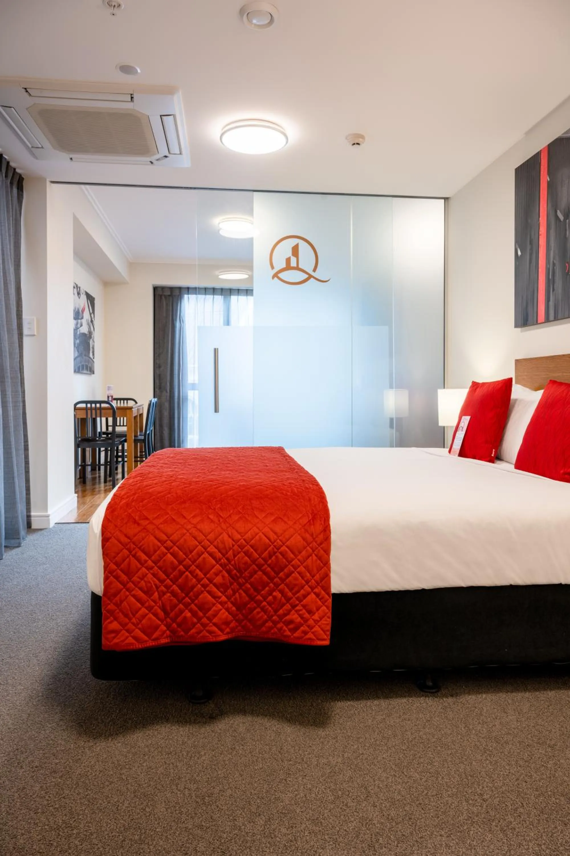 Bed in Boulcott Suites