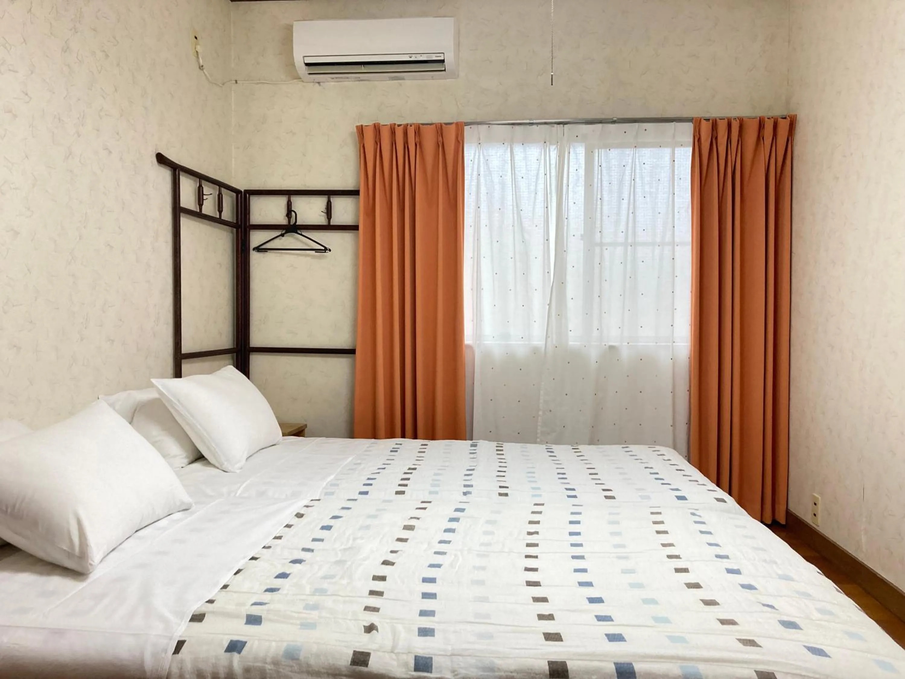 air conditioner, Bed in Guesthouse Namaste