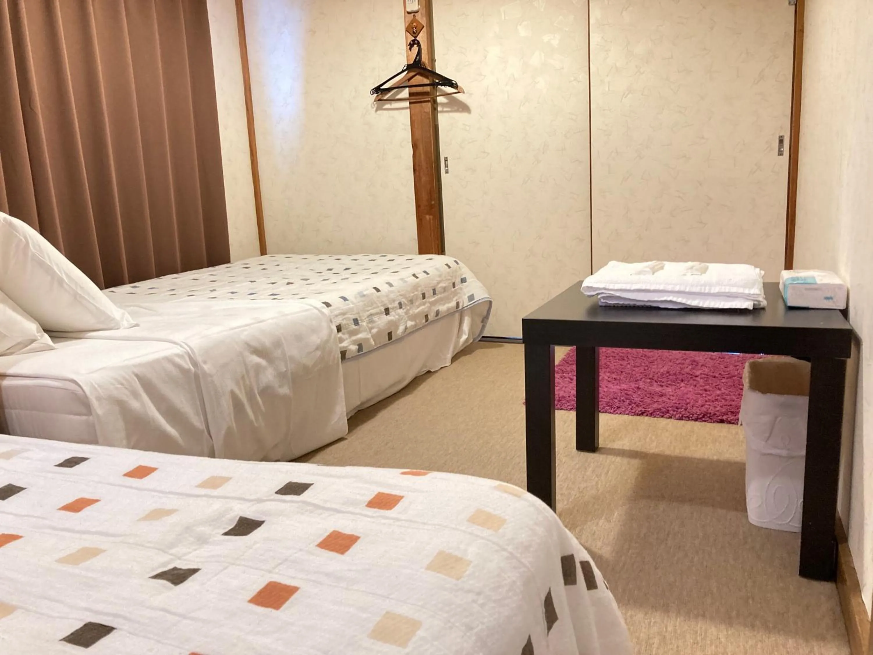 towels, Bed in Guesthouse Namaste