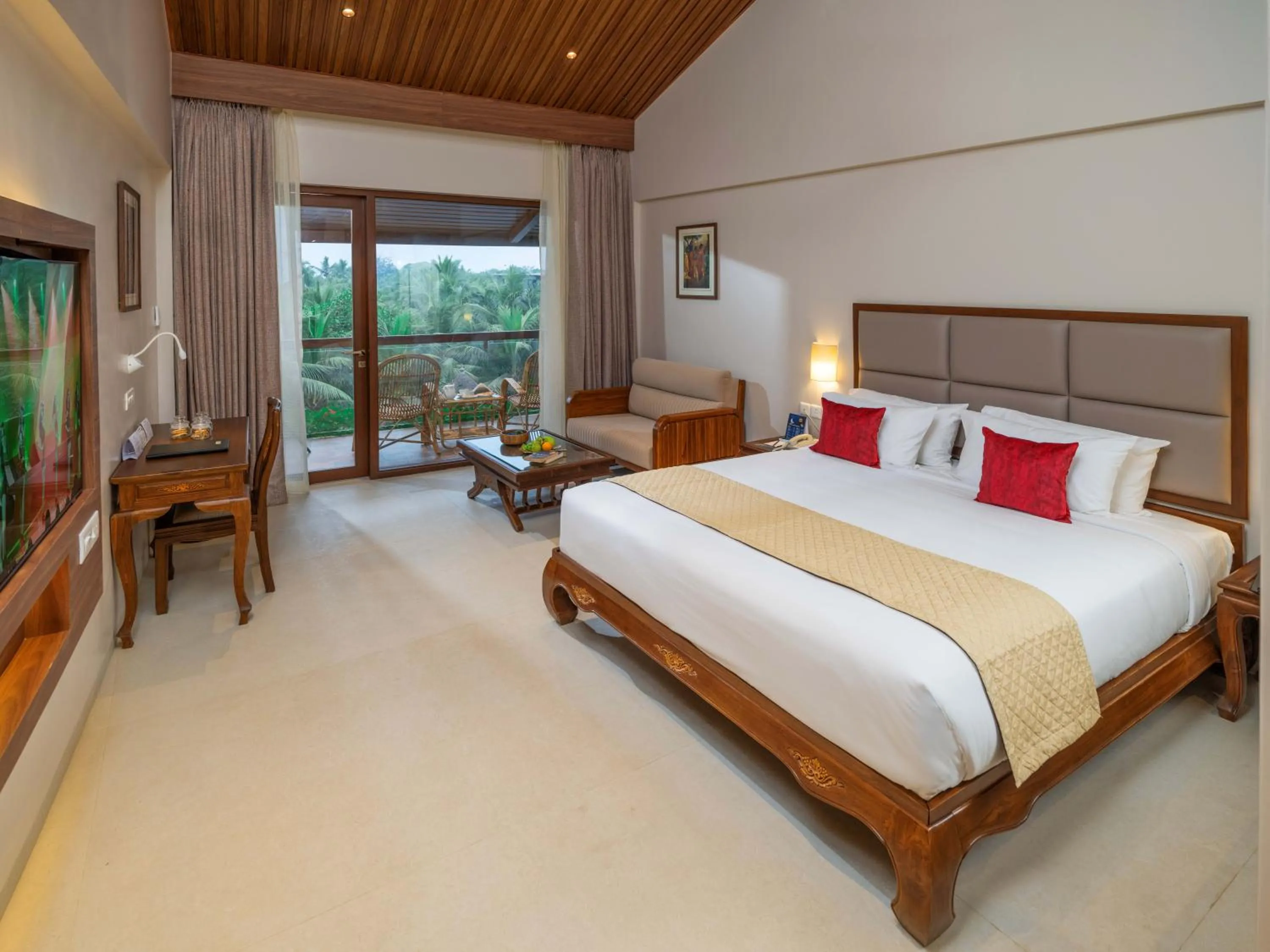 Photo of the whole room, Bed in Uday Suites - The Airport Hotel