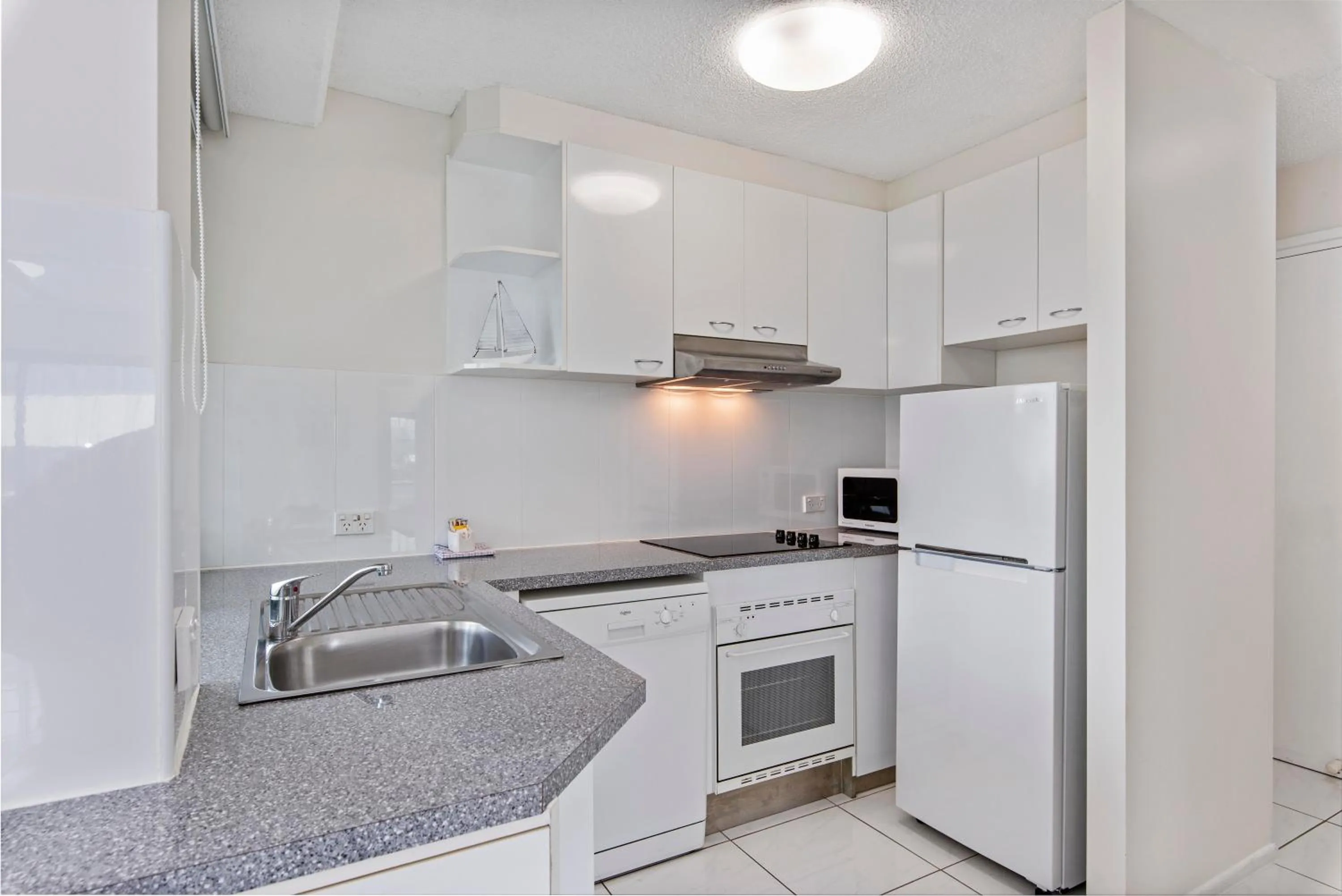 Kitchen or kitchenette in Key Largo Maroochydore