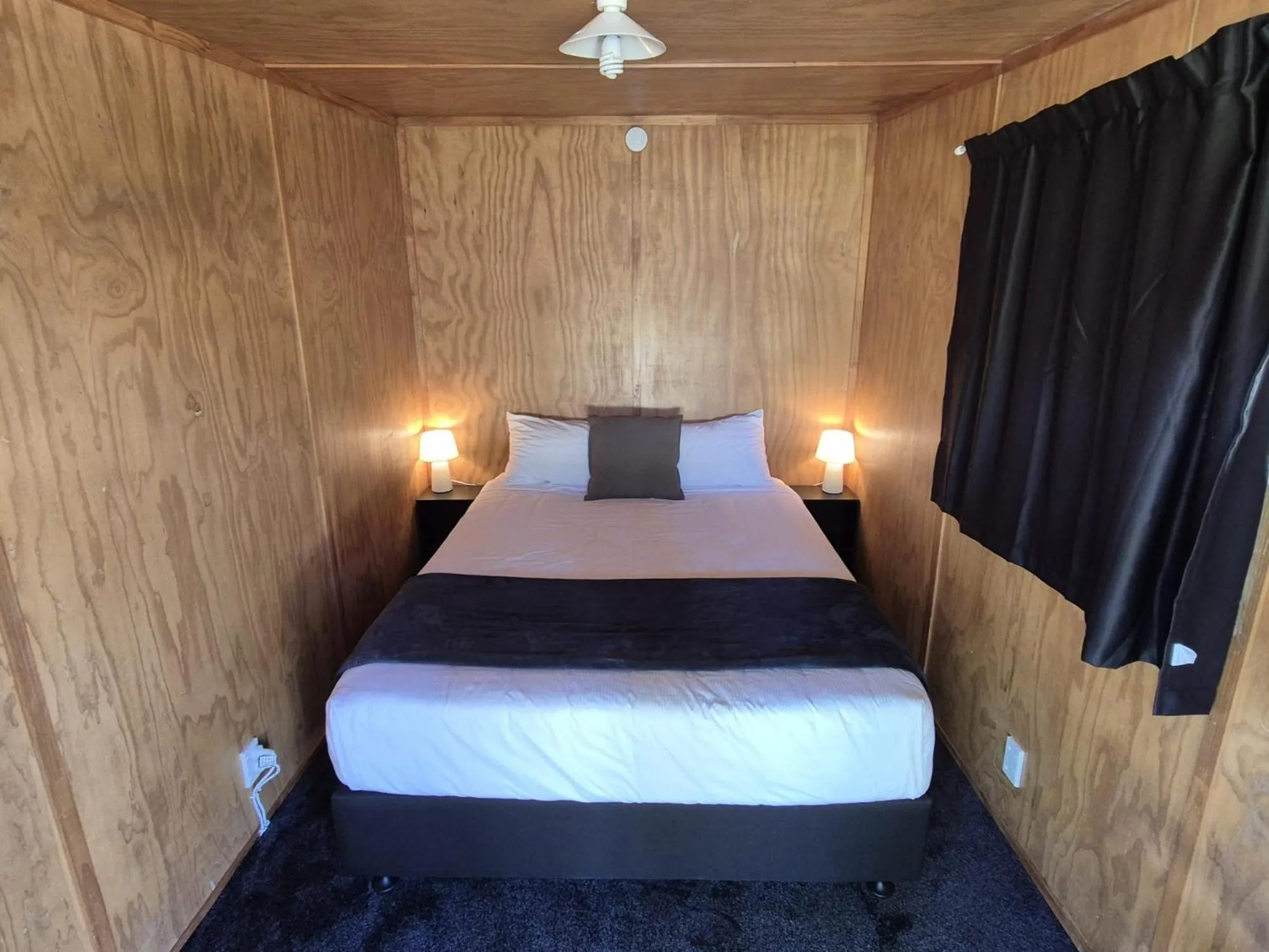 Photo of the whole room, Bed in Waitomo TOP 10 Holiday Park