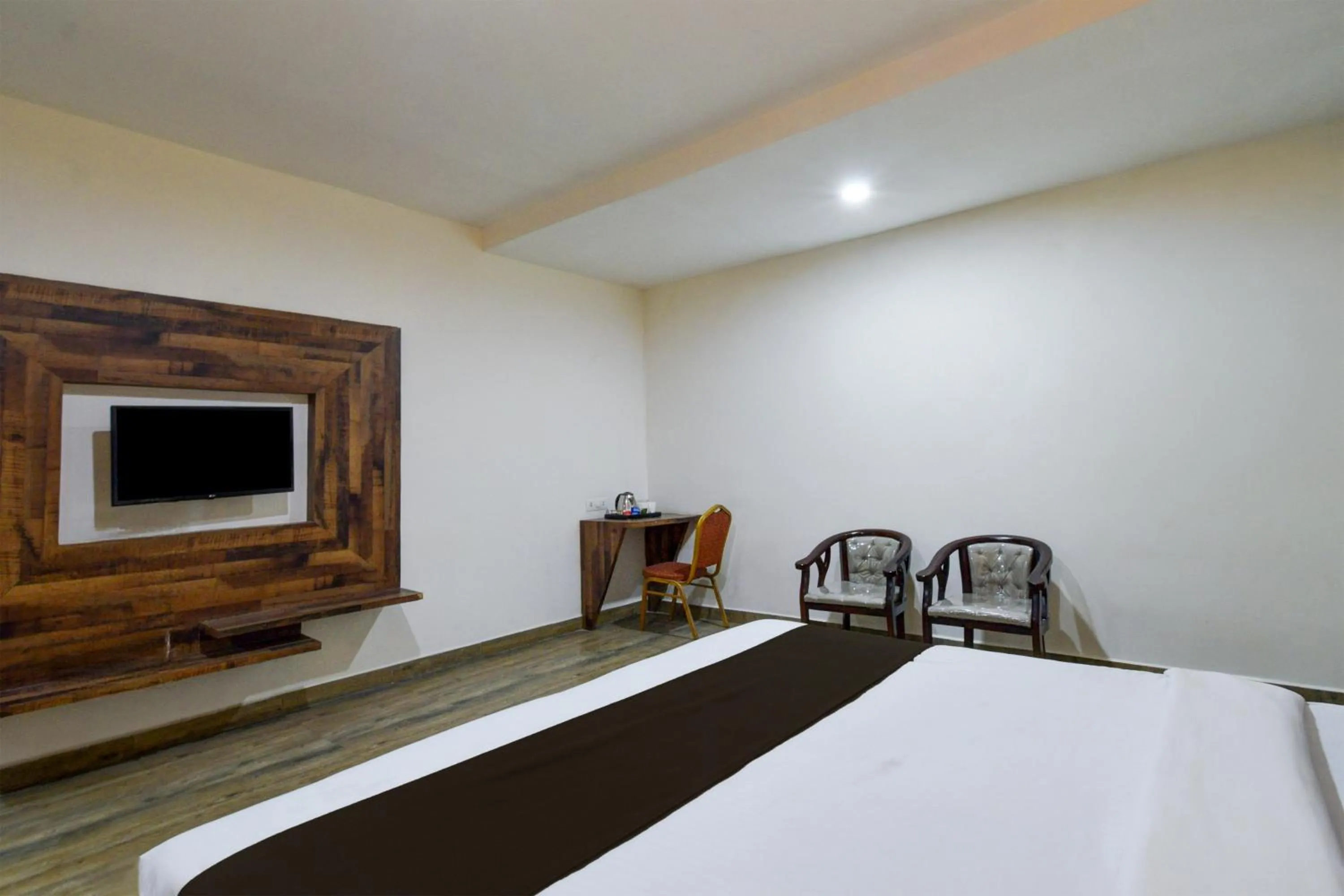 Bedroom, Bed in Super Townhouse Vanasthalipuram Formerly Hotel Surabhi