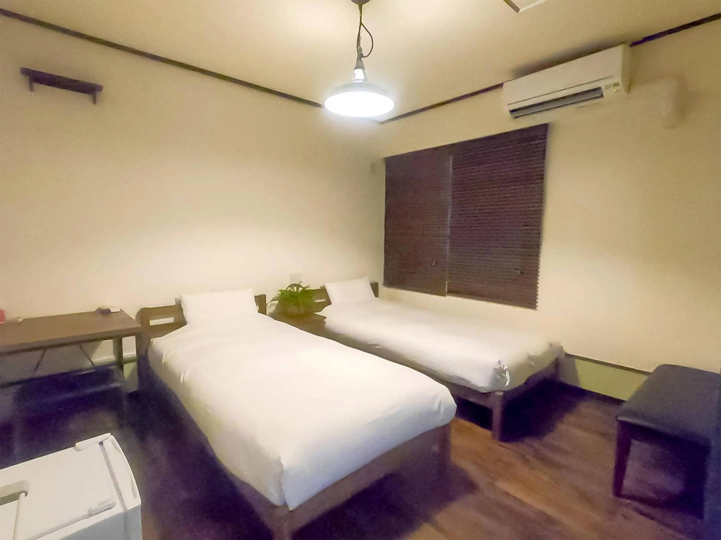 Bed in Ishigakijima Hotel Olive