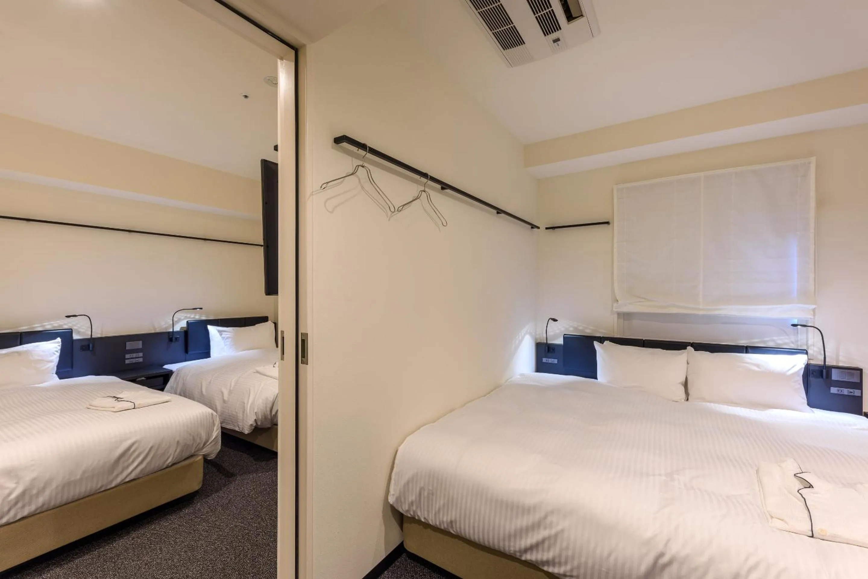 Bed in HOTEL SUI KANDA by ABEST