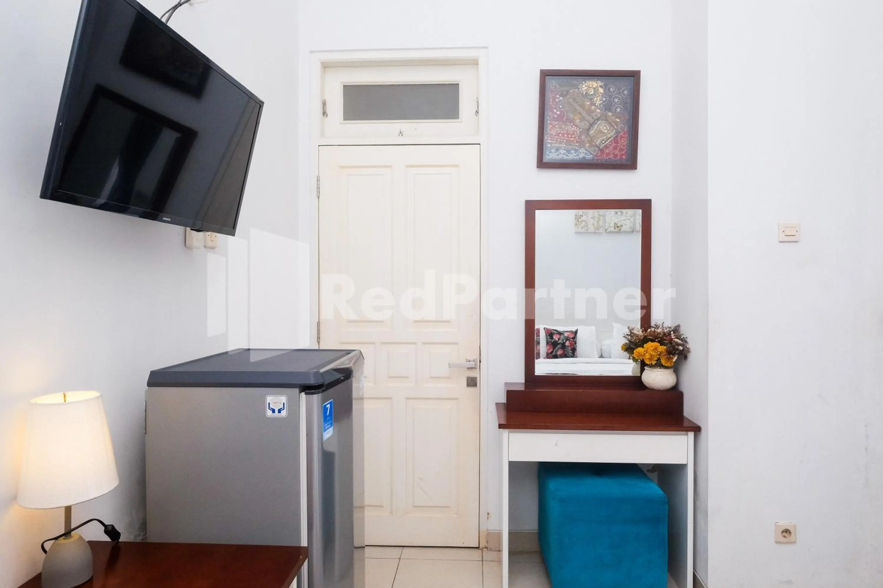 TV and multimedia in Just 11 Boutique Syariah Mitra RedDoorz near UGM Yogyakarta