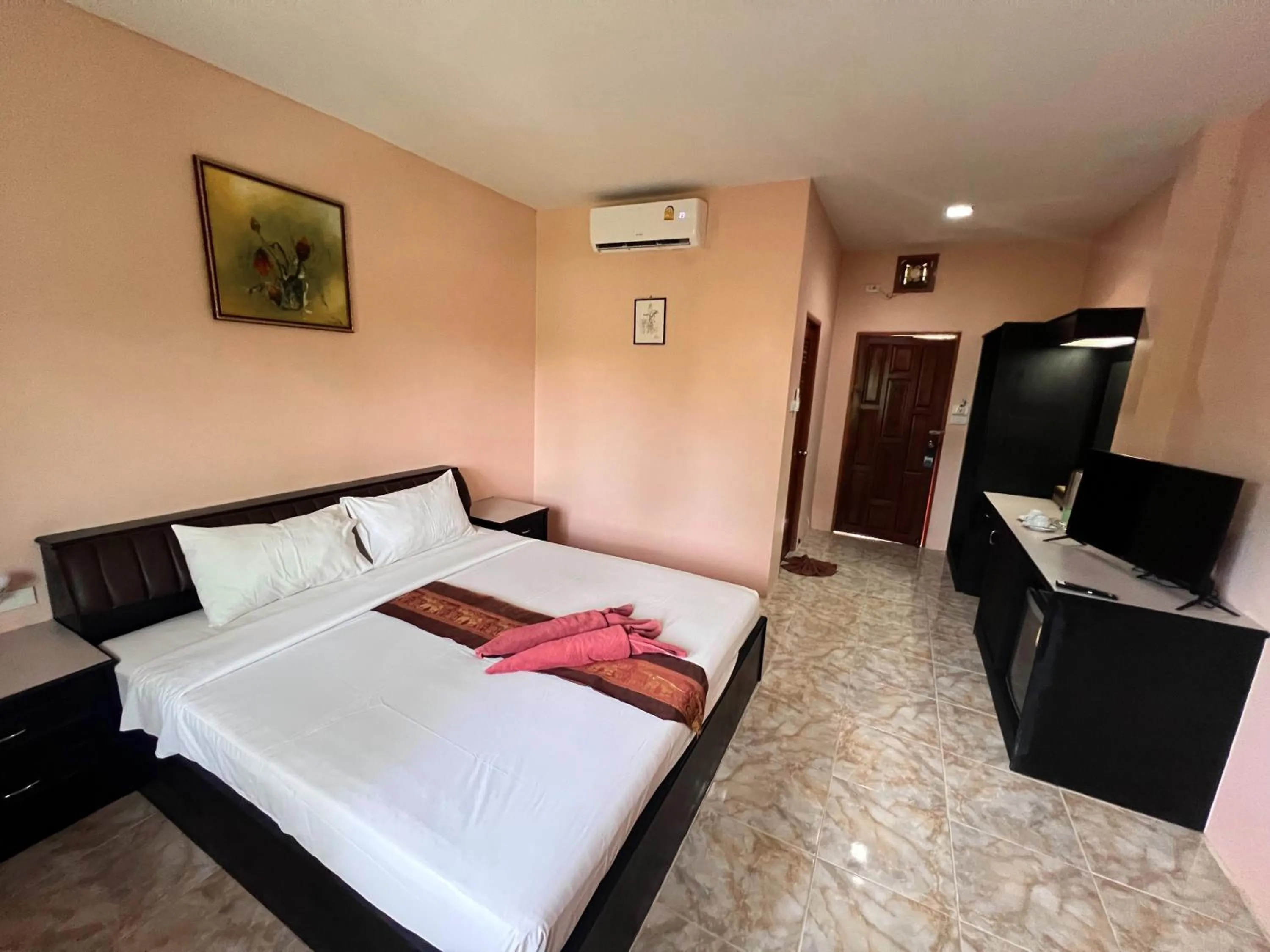 Bed in Diamond Beach Resort