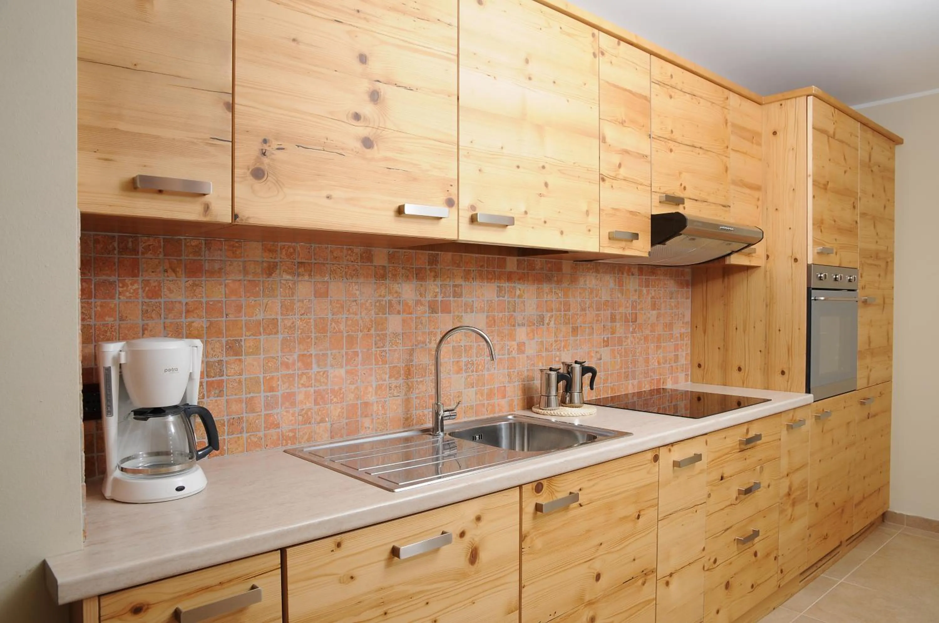 Kitchen or kitchenette in Residence Marisol Camere & Appartamenti - Mezzana Centre