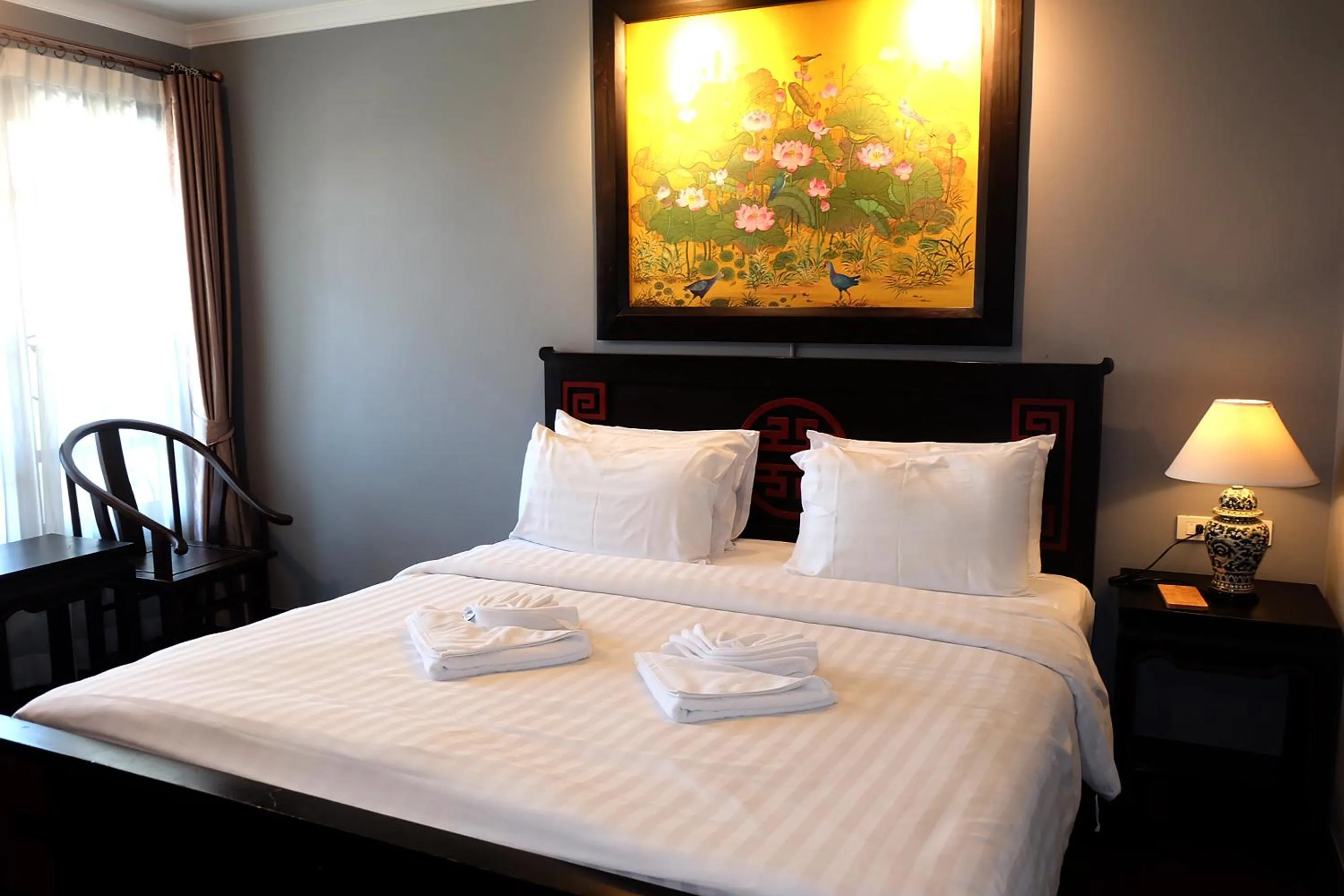 Bed in Siri Heritage Bangkok Hotel