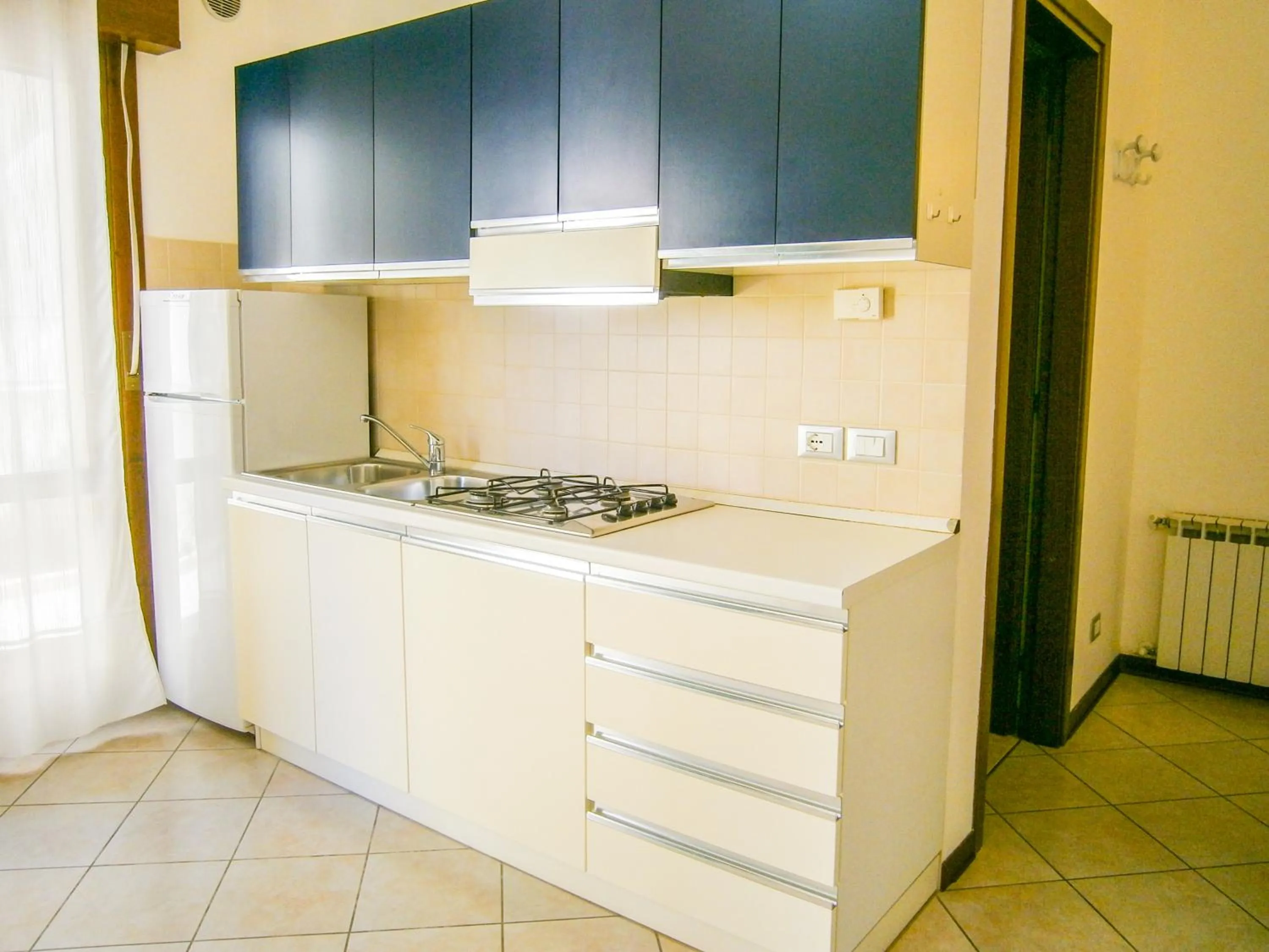 Kitchen or kitchenette in Residence Mediterraneo - Agenzia Cocal