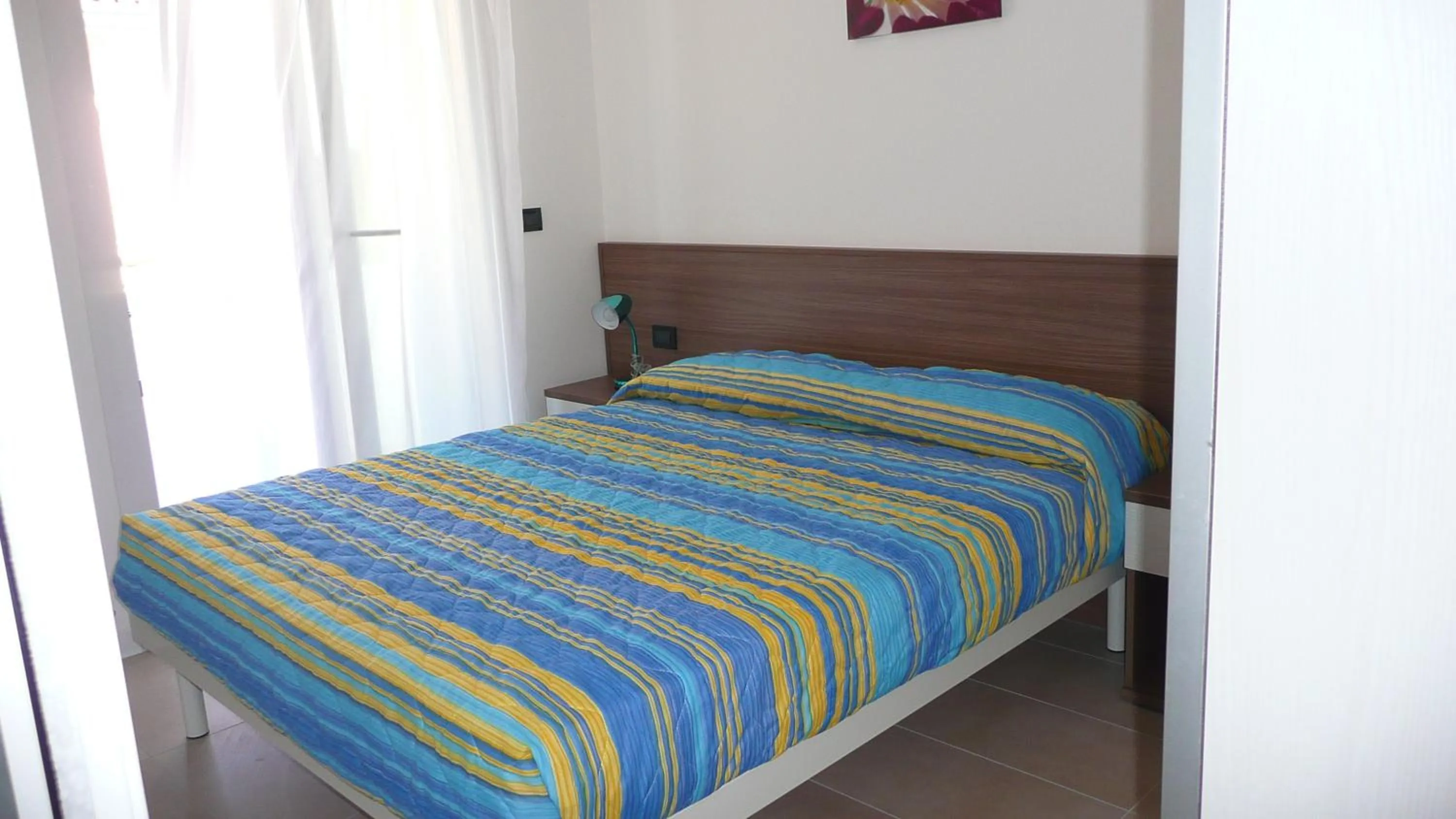 Bedroom, Bed in Villa Marina Apartments - Agenzia Cocal