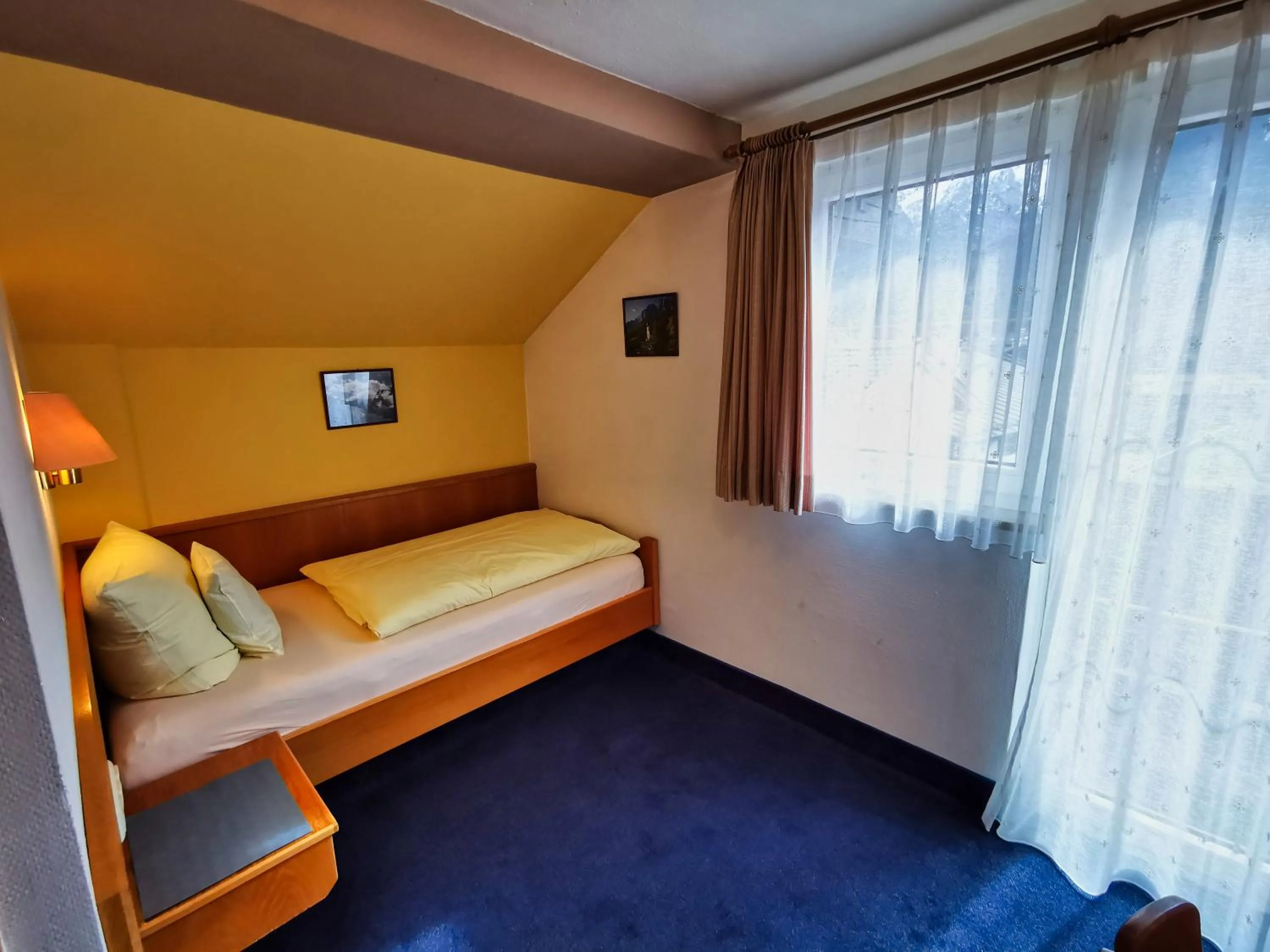 Photo of the whole room, Bed in Zum Franziskaner