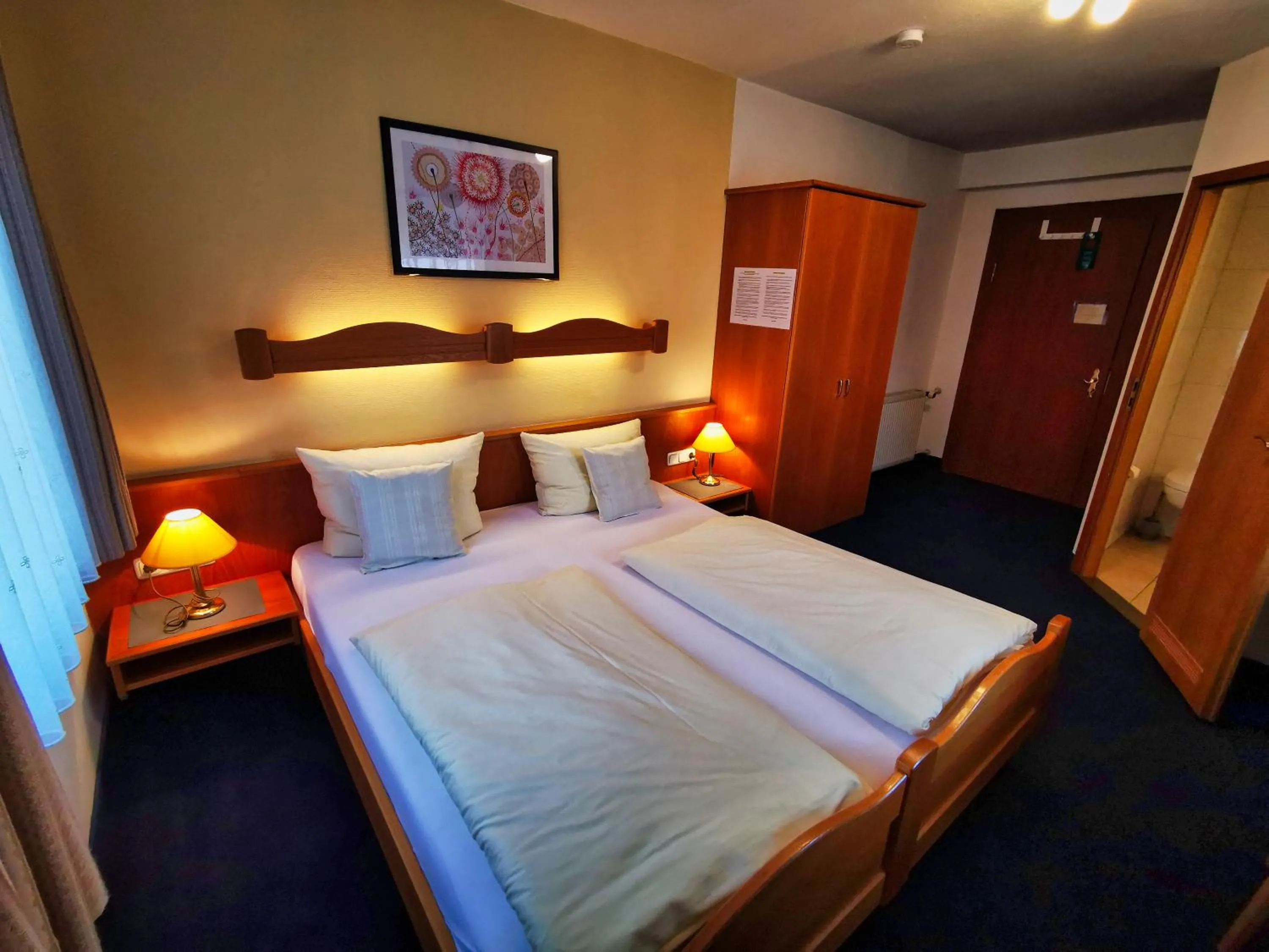 Photo of the whole room, Bed in Zum Franziskaner