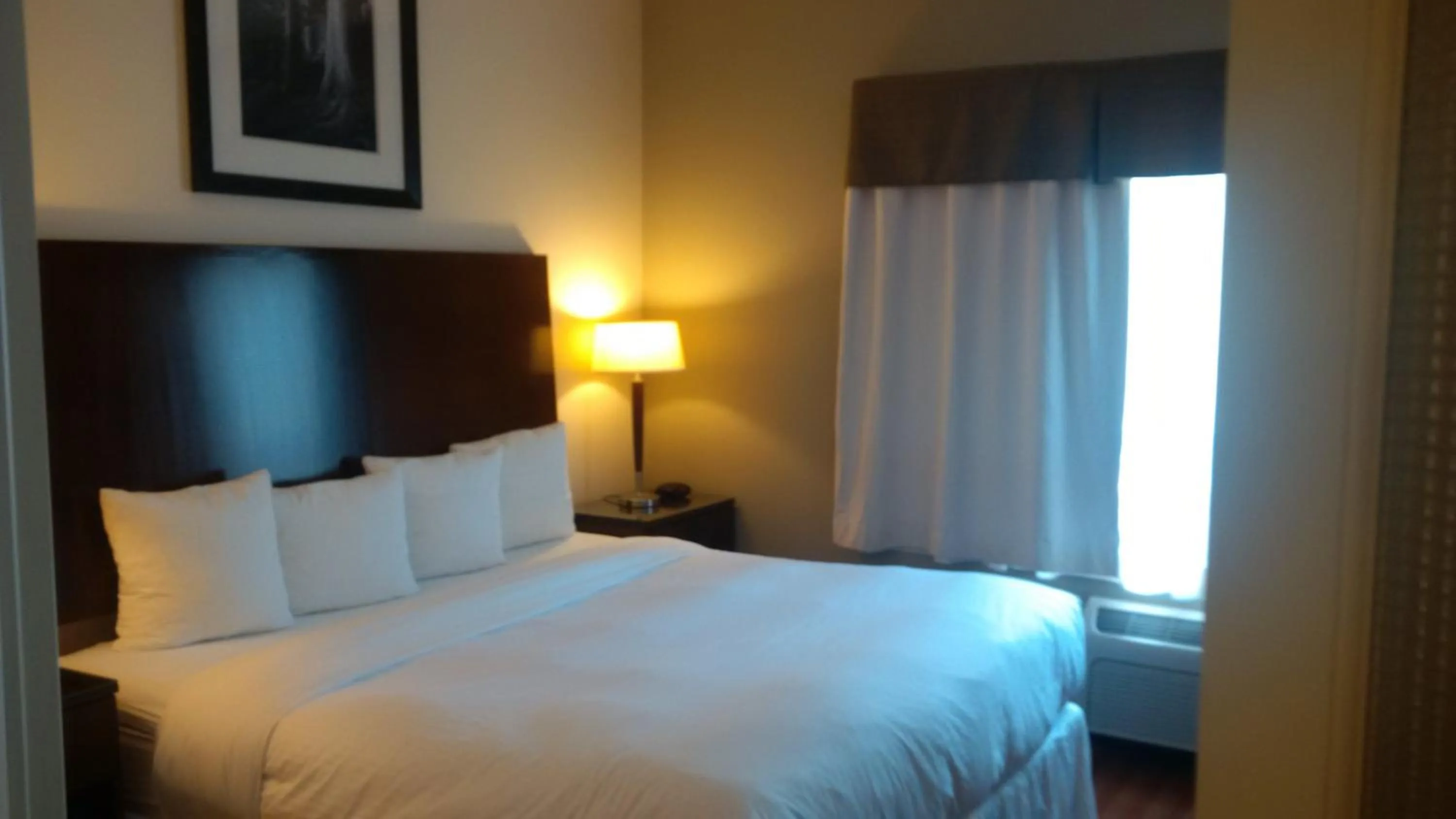 Bed in Sigma Inn & Suites Hudson's Hope